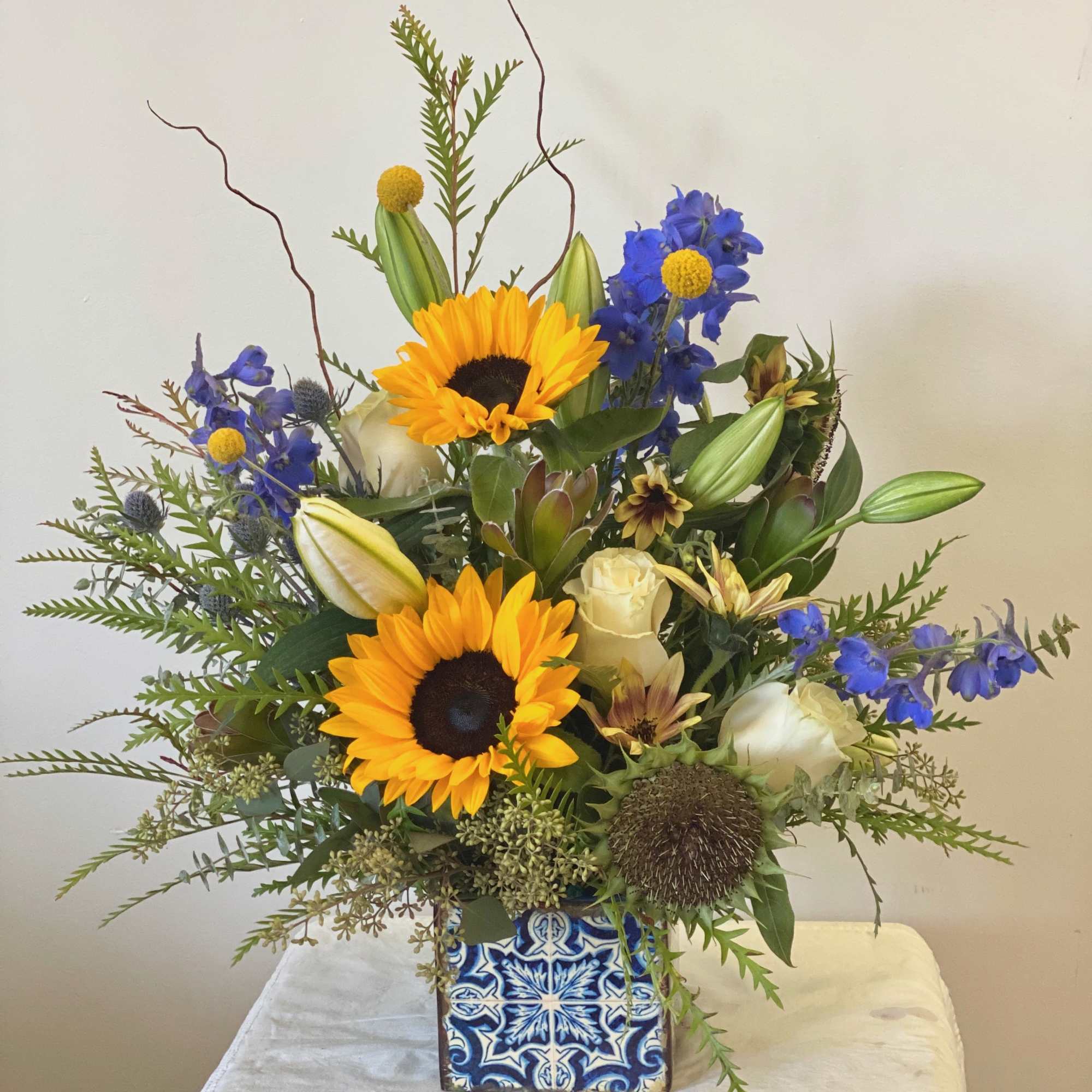 A bright and cheerful arrangement to spread some cheer to those needing