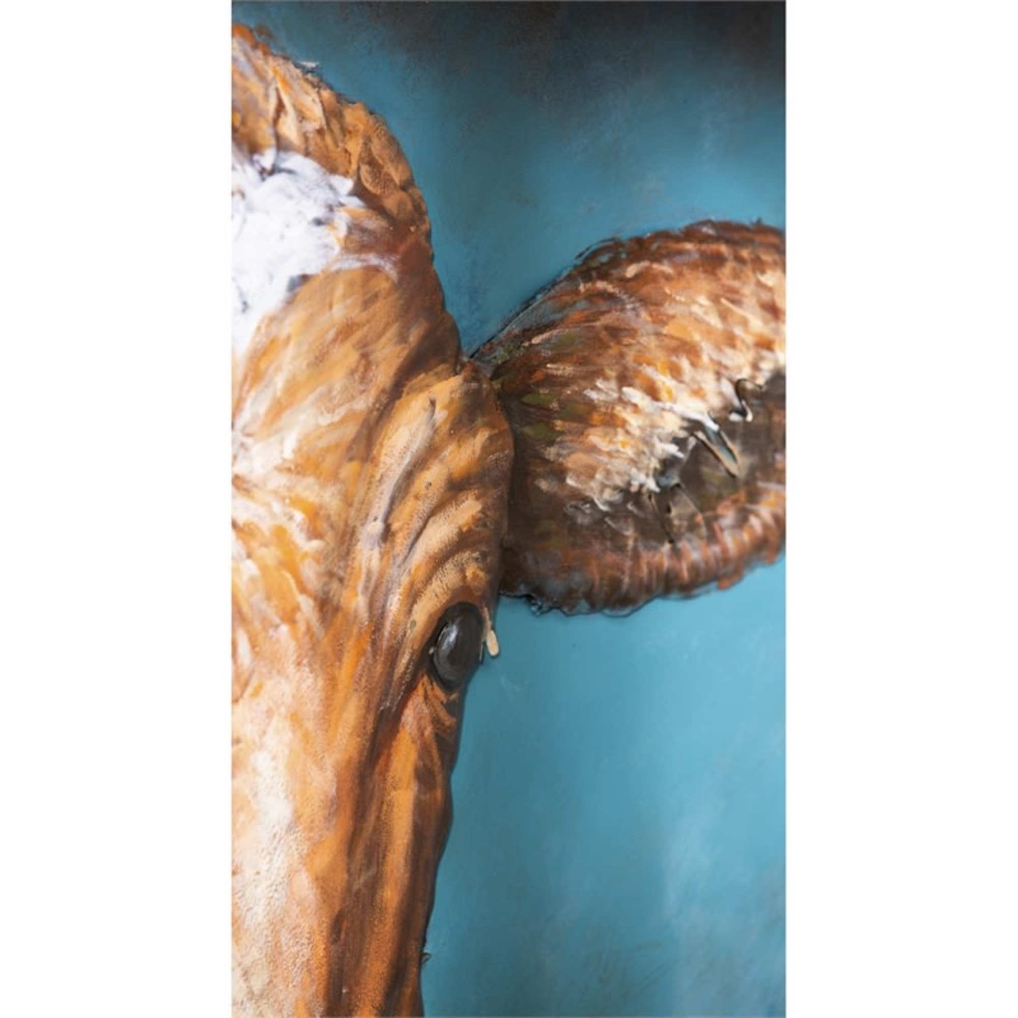 This metal (iron) wall d&eacute;cor is handcrafted and features a closeup of