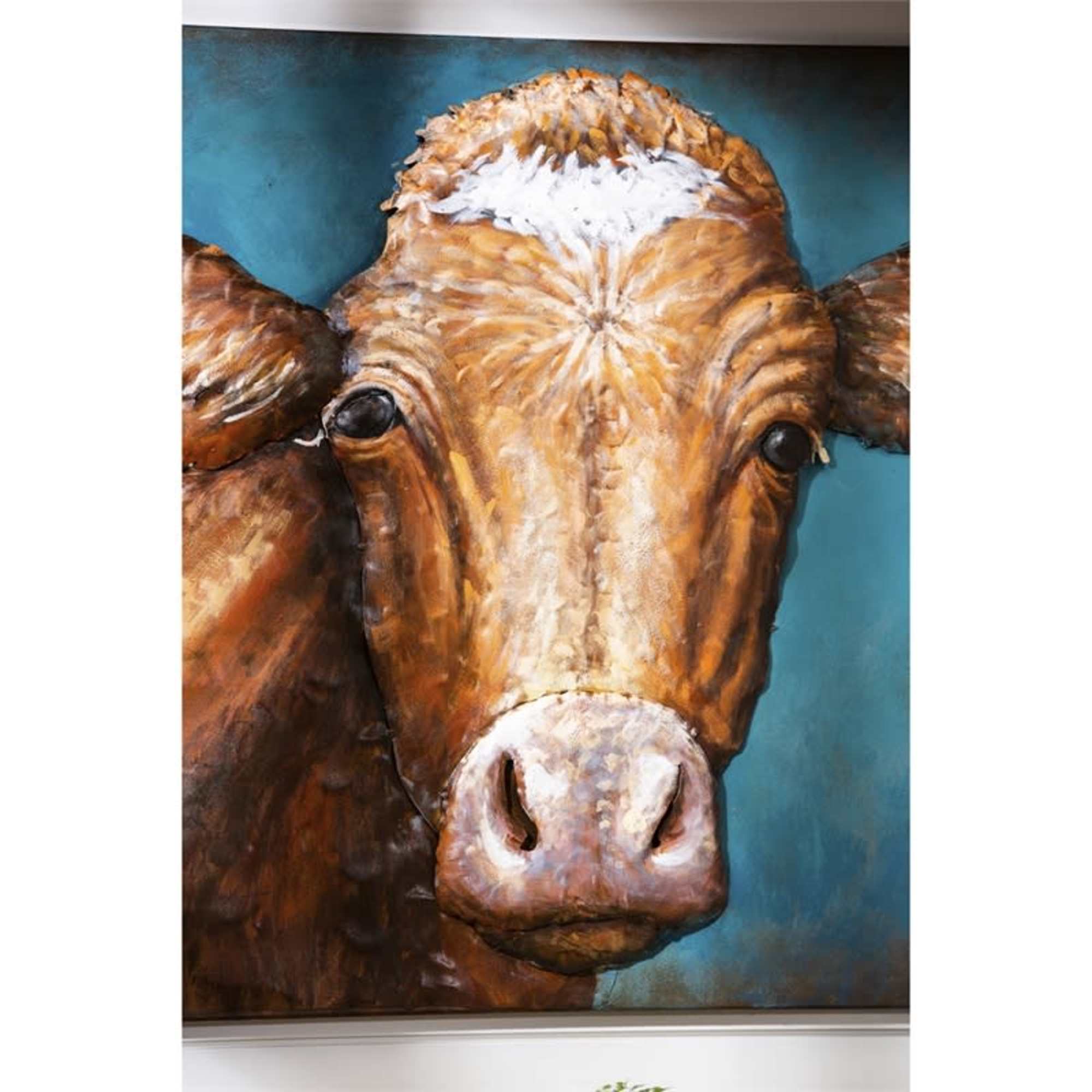 This metal (iron) wall d&eacute;cor is handcrafted and features a closeup of