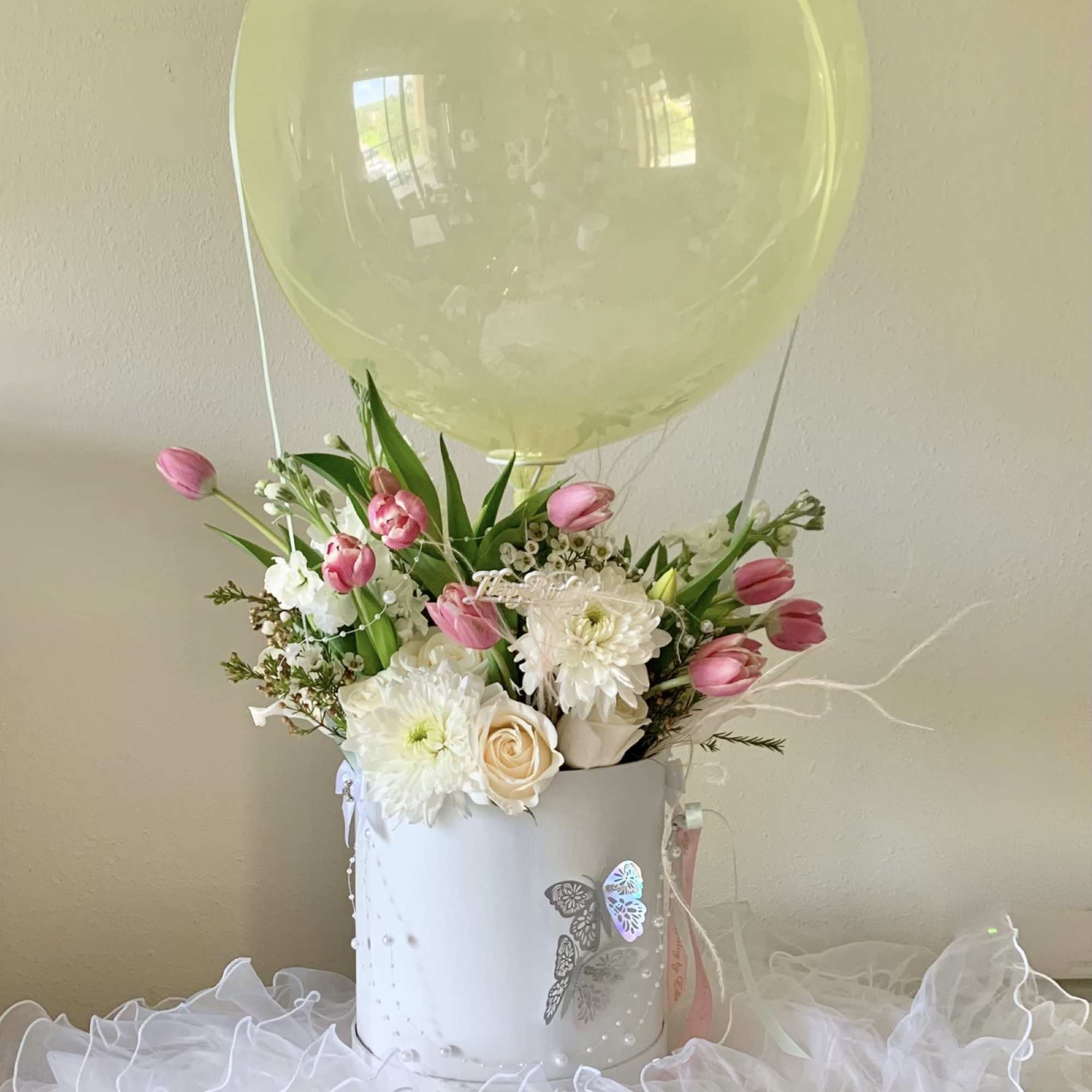 Bubble balloon flower arrangement. Choose your own pallet. Arrangement will be delivered
