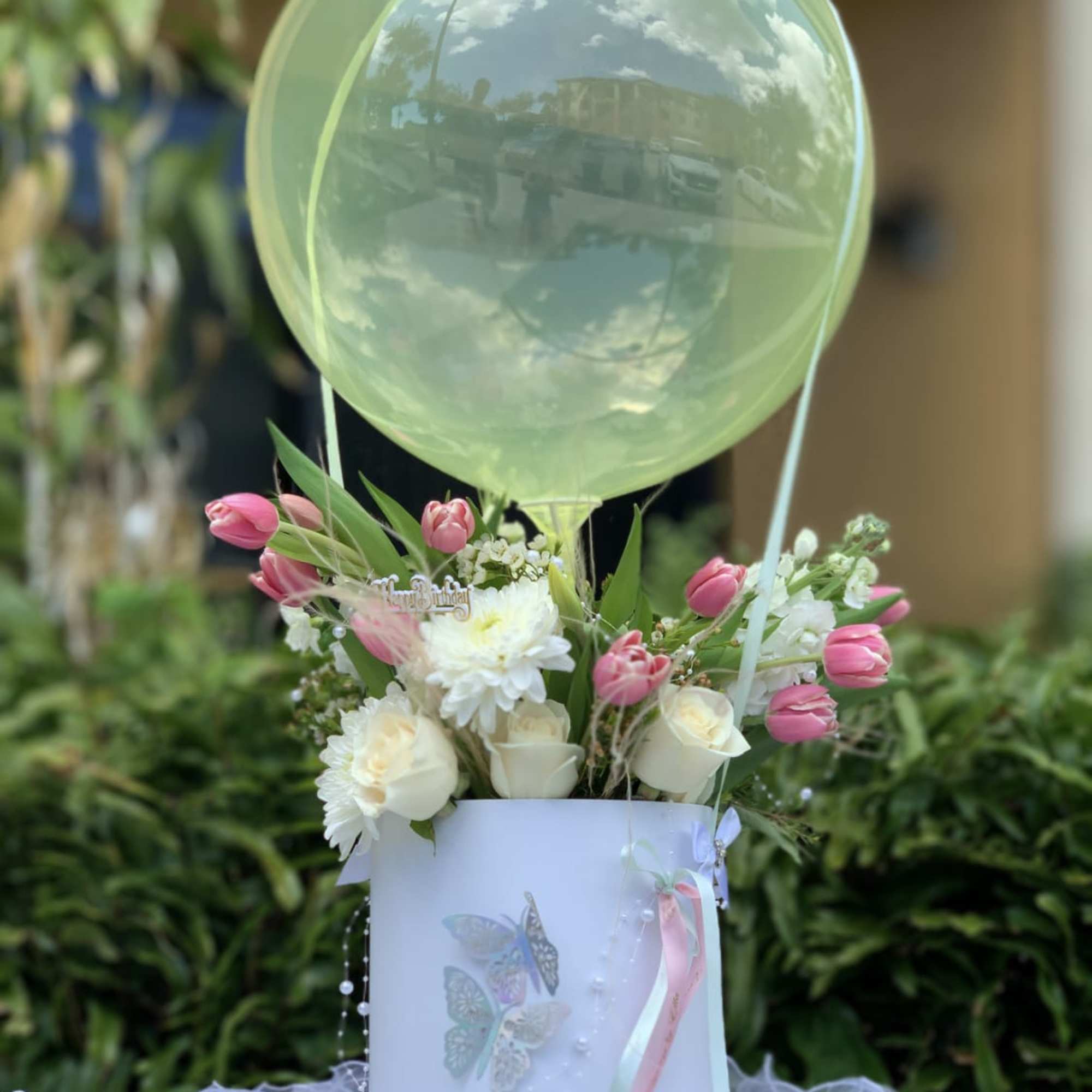 Bubble balloon flower arrangement. Choose your own pallet. Arrangement will be delivered