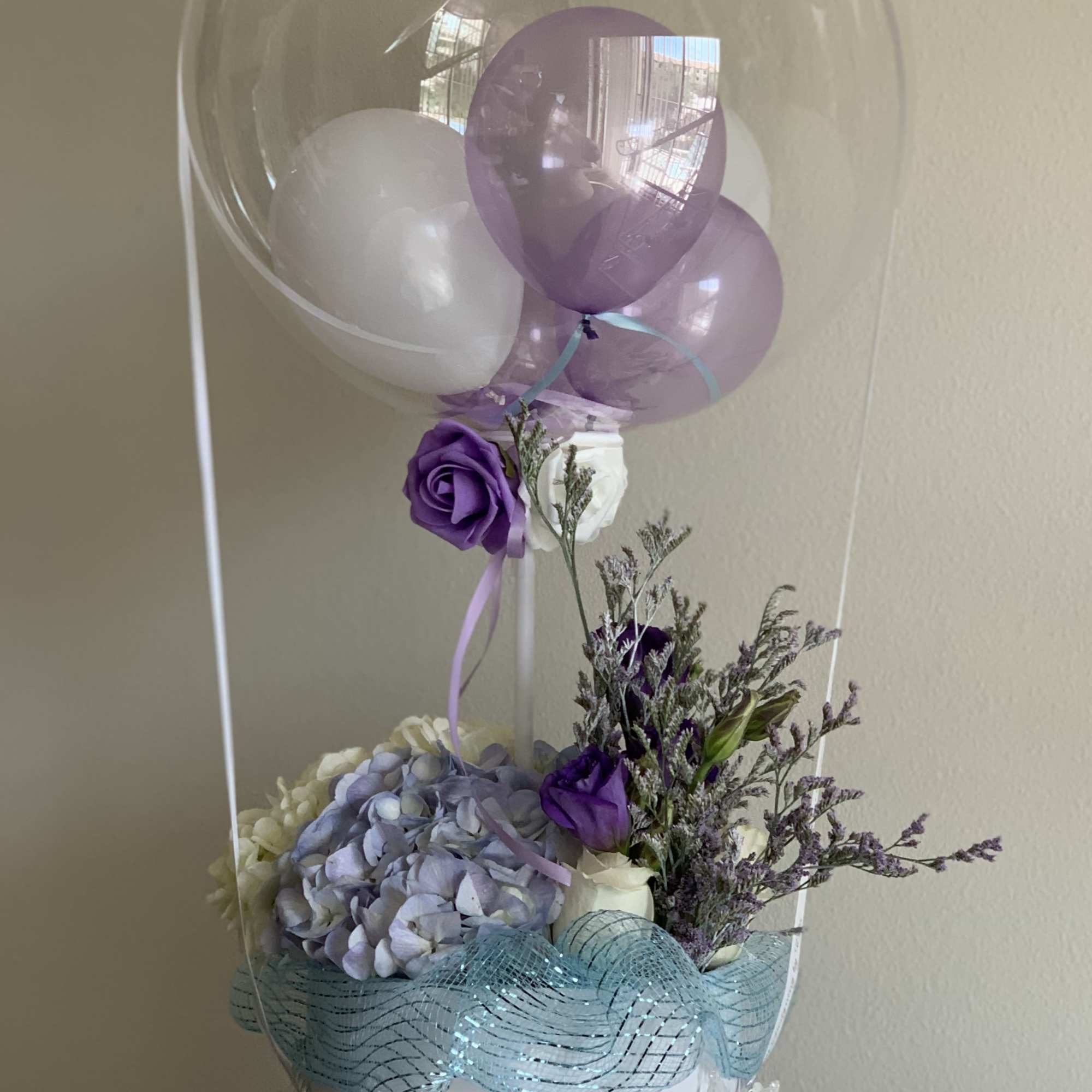 Thematic floral arrangement with a lot of accessories 