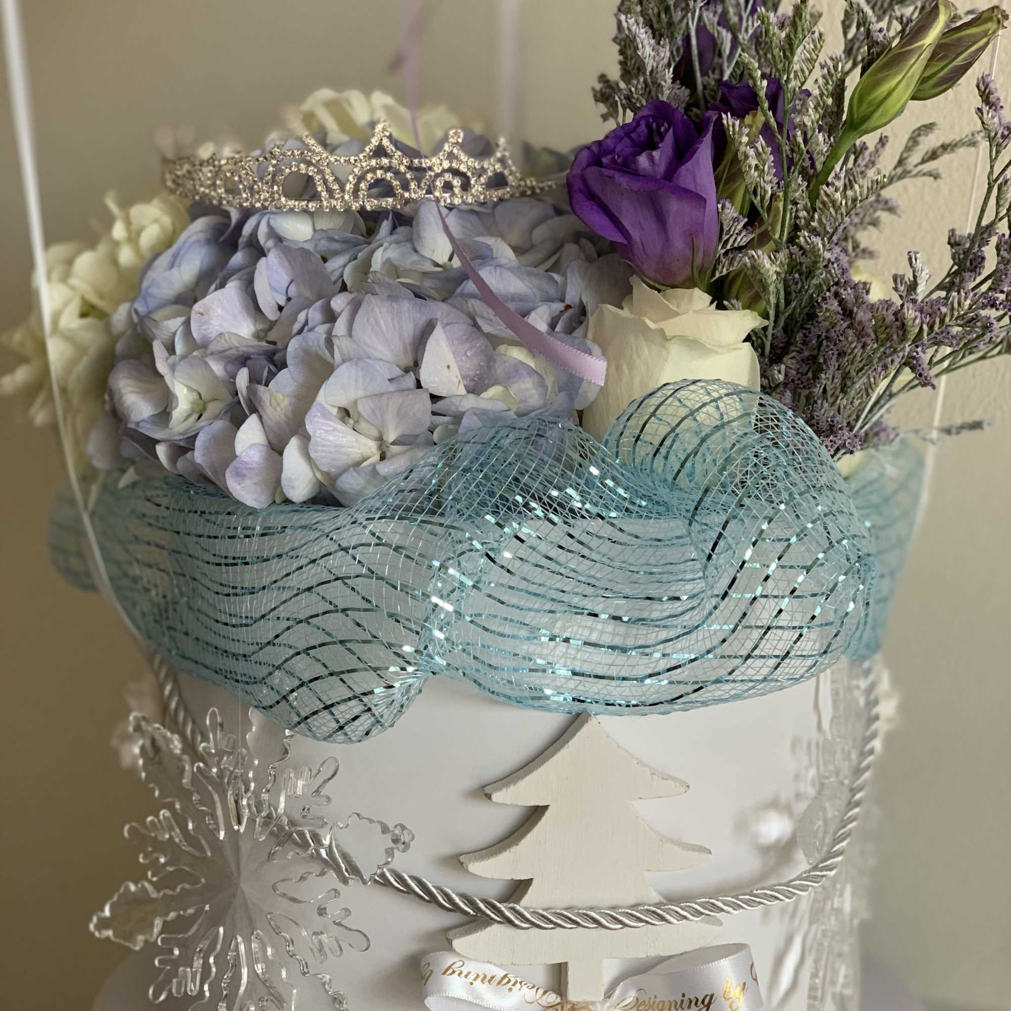 Thematic floral arrangement with a lot of accessories 