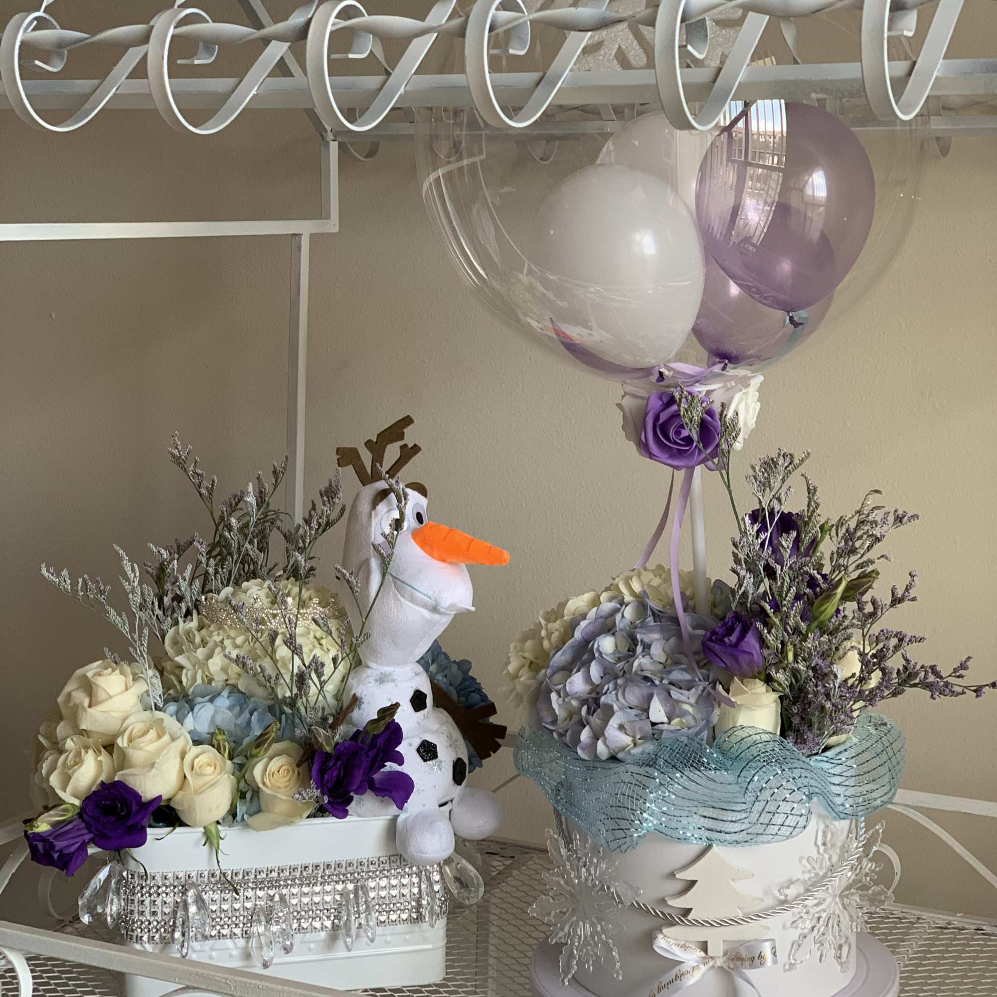 Thematic floral arrangement with a lot of accessories 