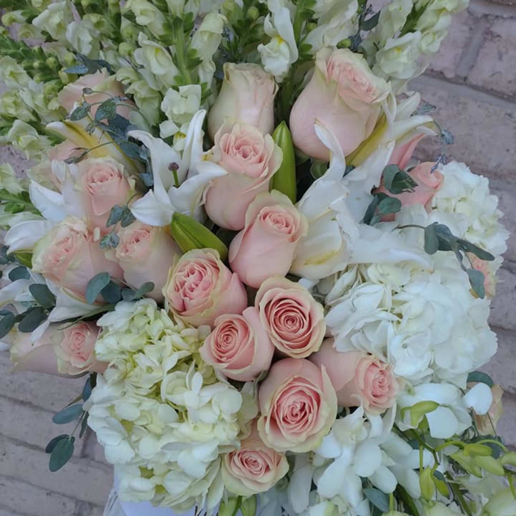 a Beautiful lush box of flowers. This box comes filled with Roses