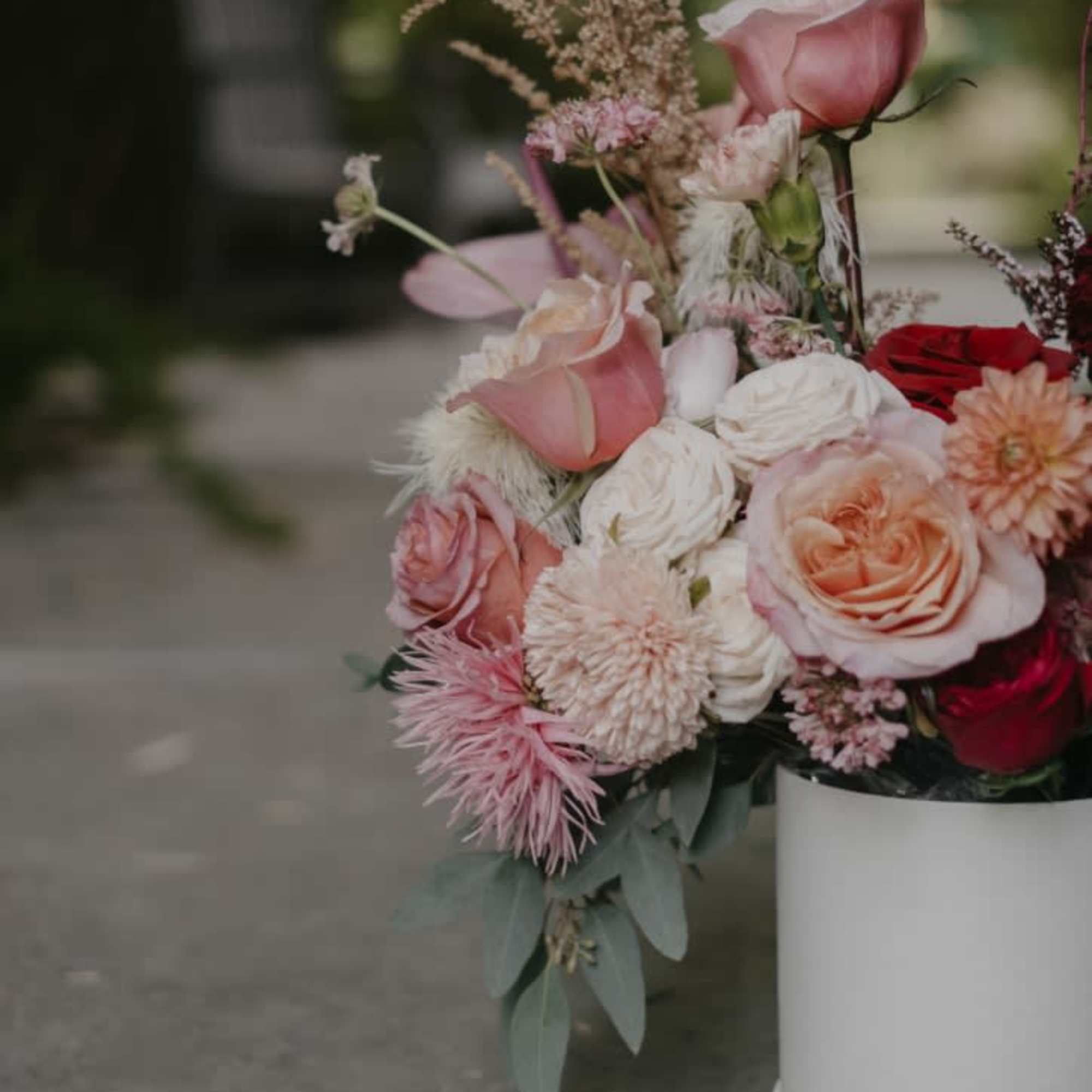 This incredible architectural arrangement combines a variety of blooms to create a