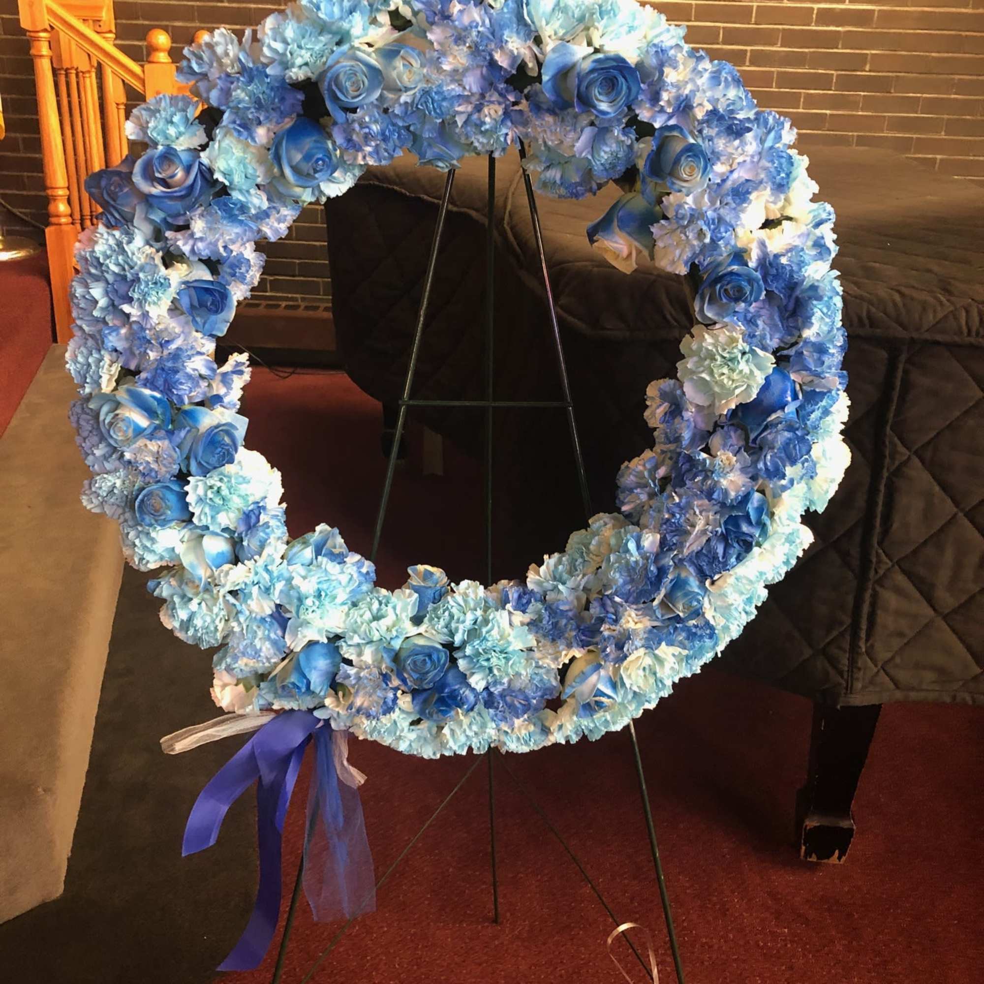 Twenty inch wreath filled with carnations