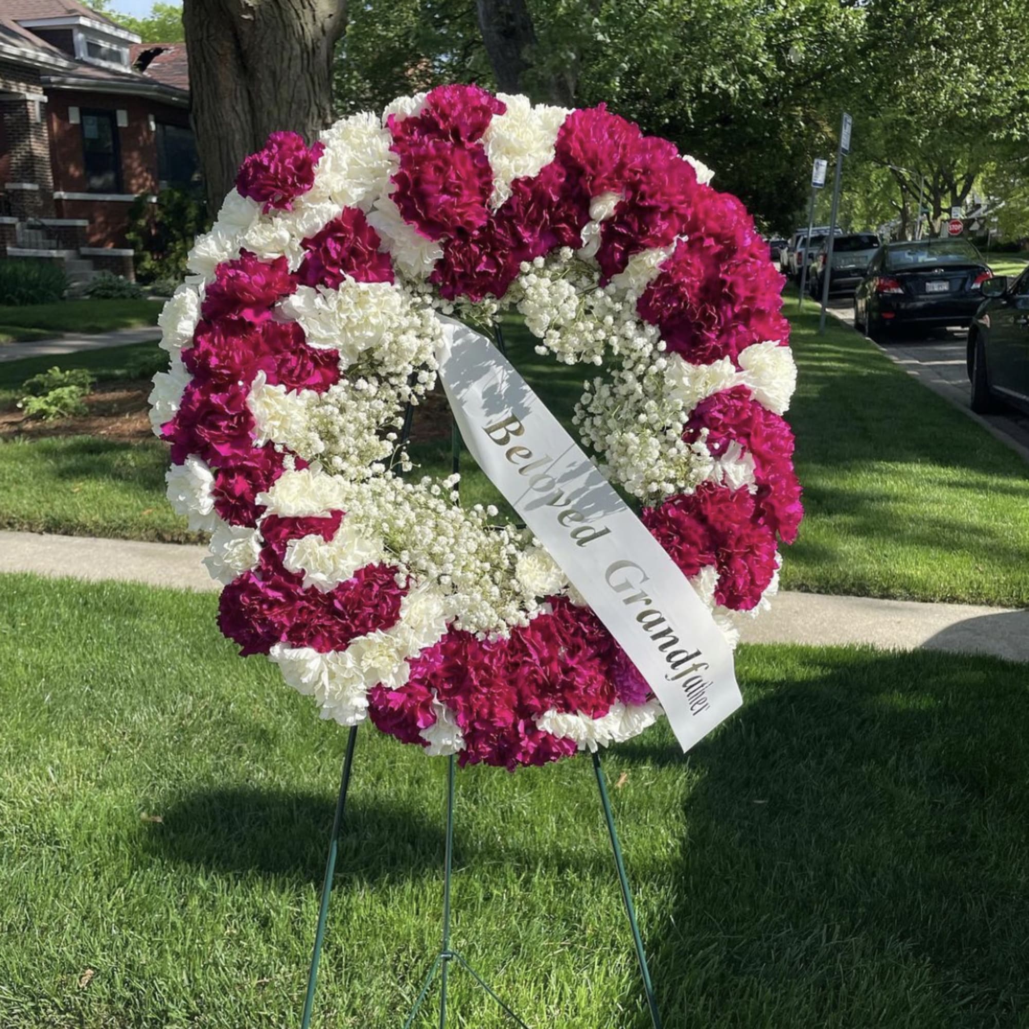 Twenty inch wreath filled with carnations