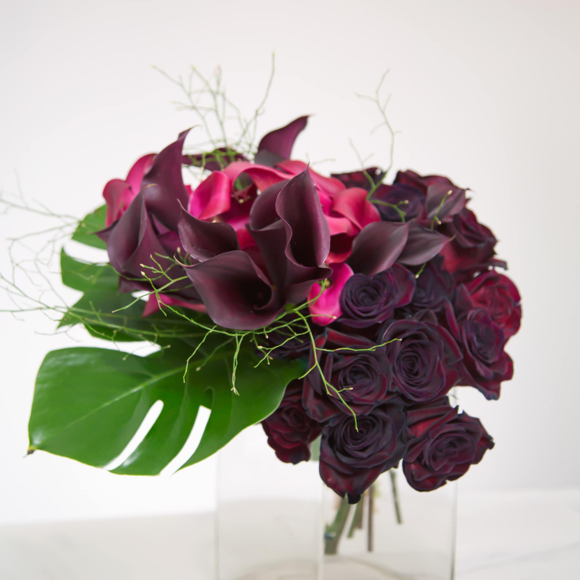 An apt moniker, Magic is composed of black and red calla lily An apt moniker, Magic is composed of black and red calla lily