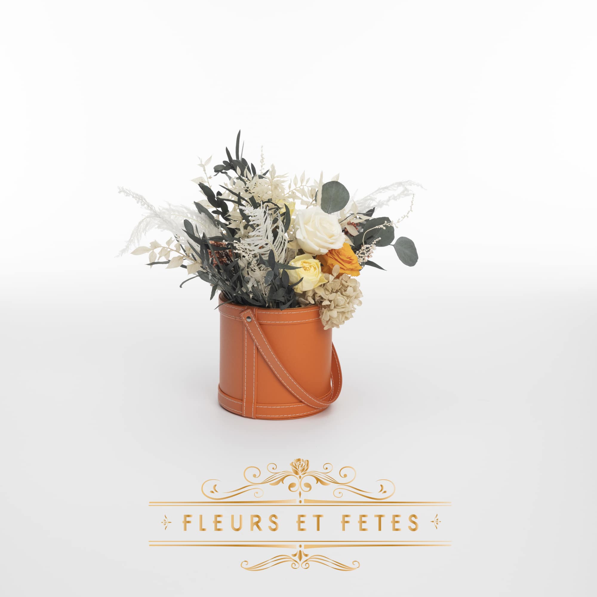 This timeless arrangement is a part of our Everlasting Collection and features