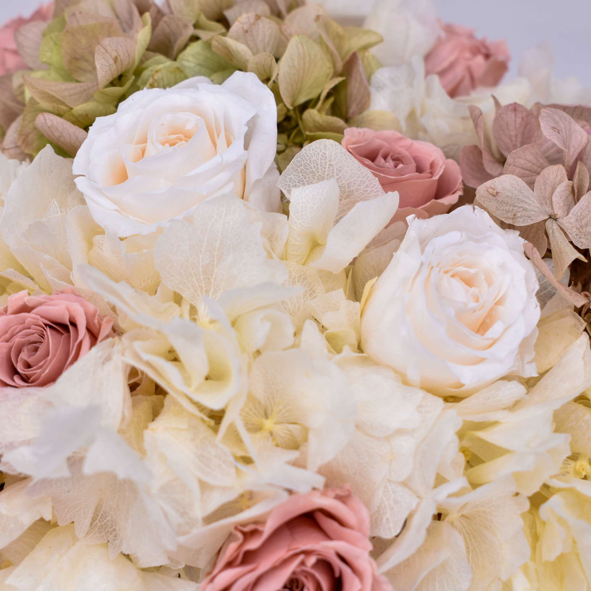 This timeless arrangement is a part of our Everlasting Collection and features