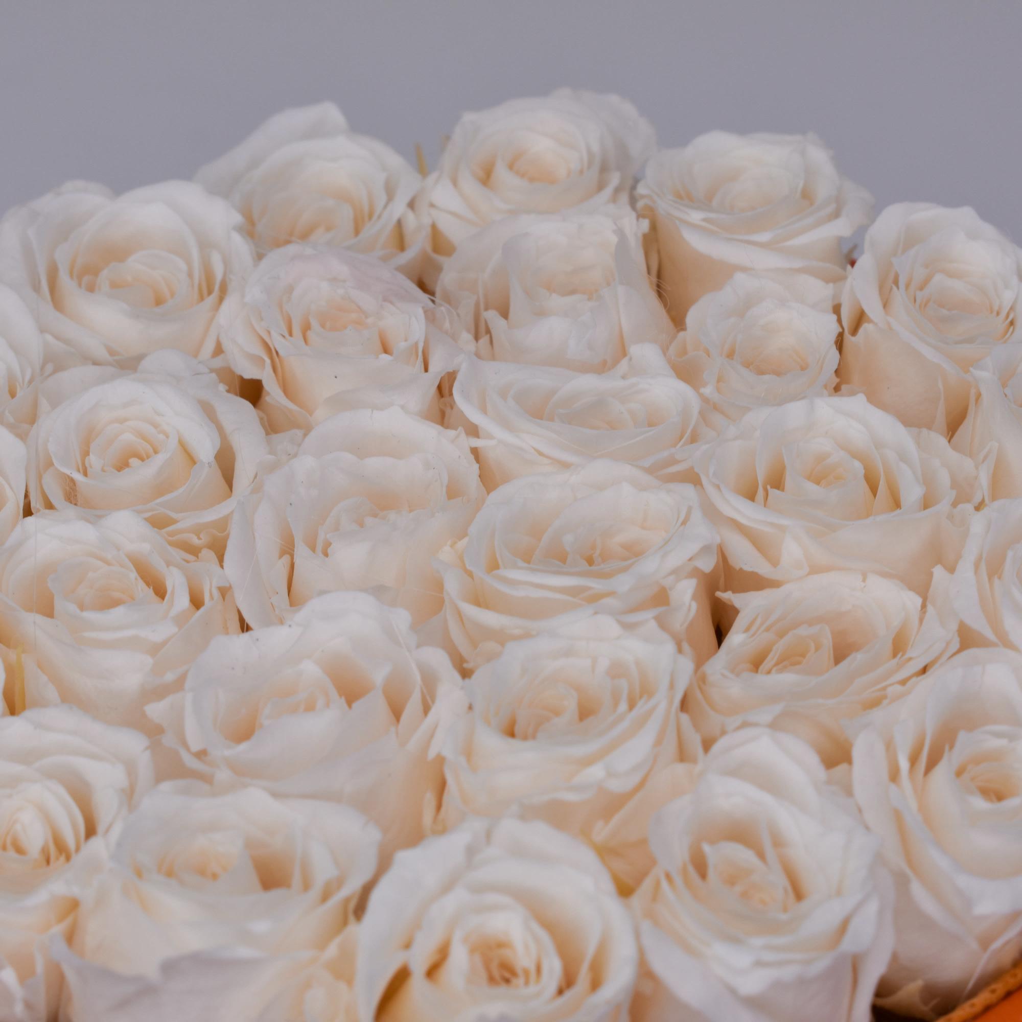 This timeless arrangement is a part of our Everlasting Collection and features