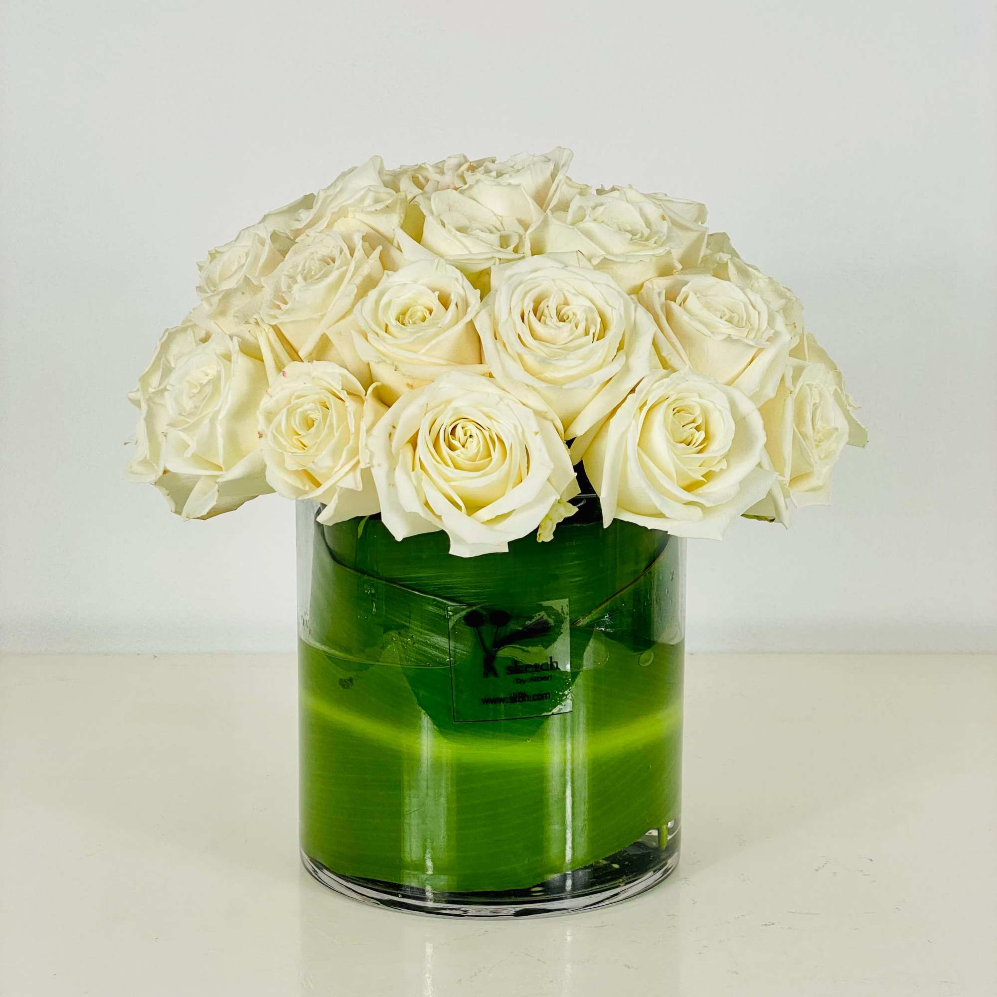 Make a bold statement with this elegant, yet simple, design. White roses