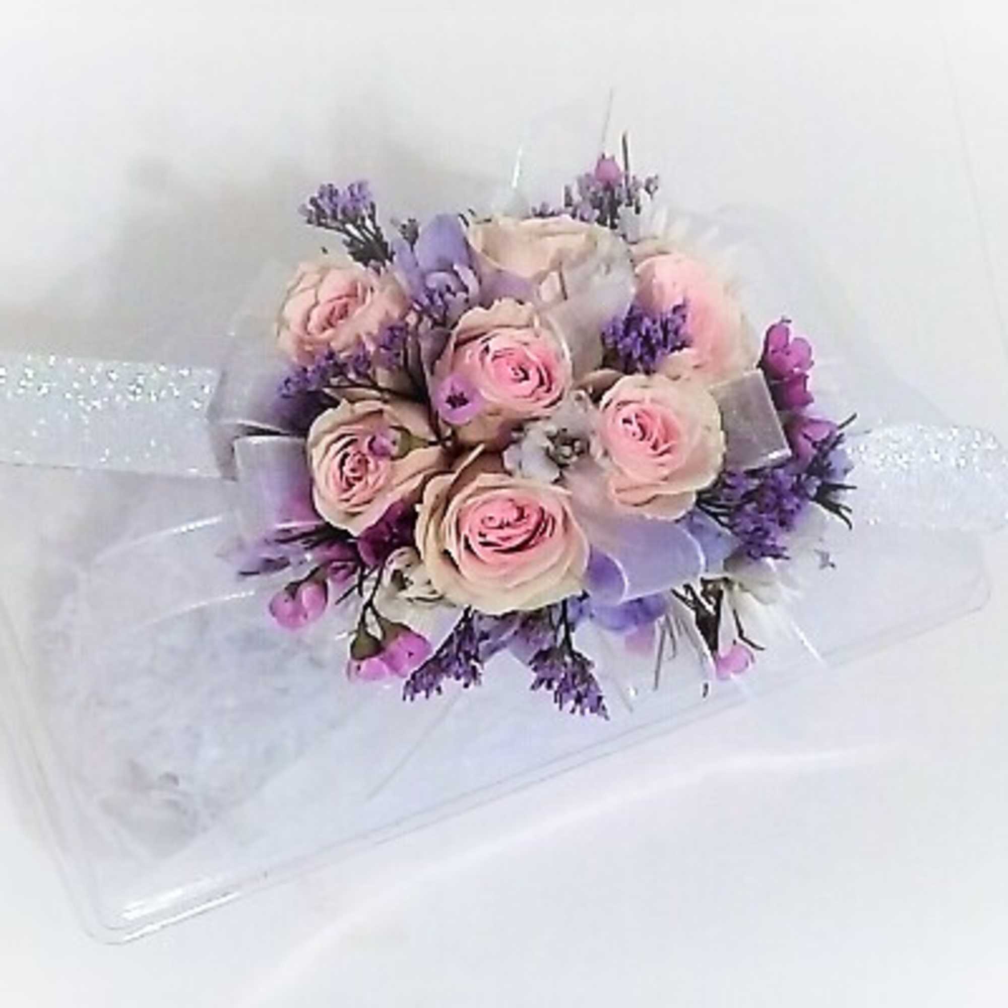 Corsages starting at $34.99.Other examples shown in weddings and prom gallery, click