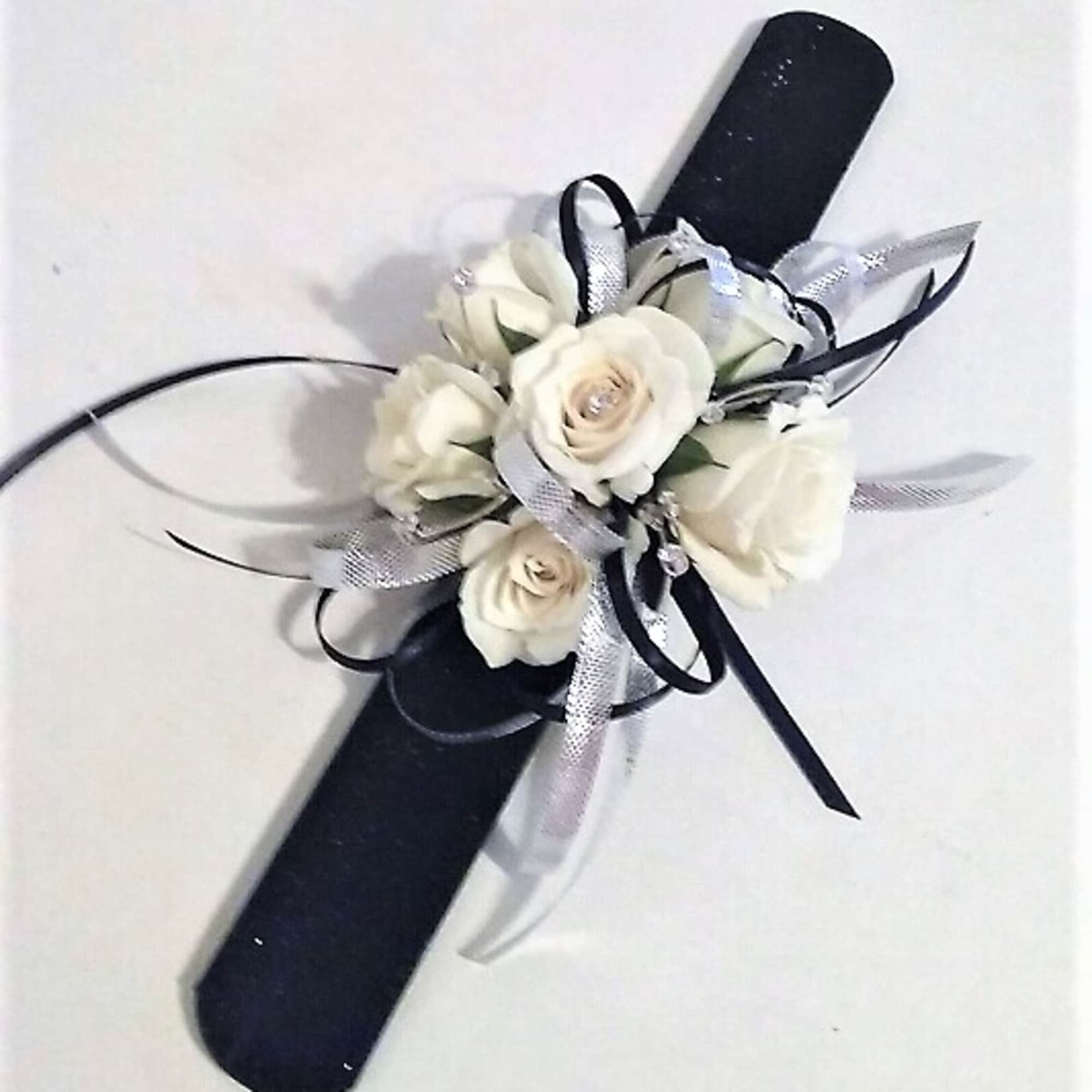 Corsages starting at $34.99.Other examples shown in weddings and prom gallery, click
