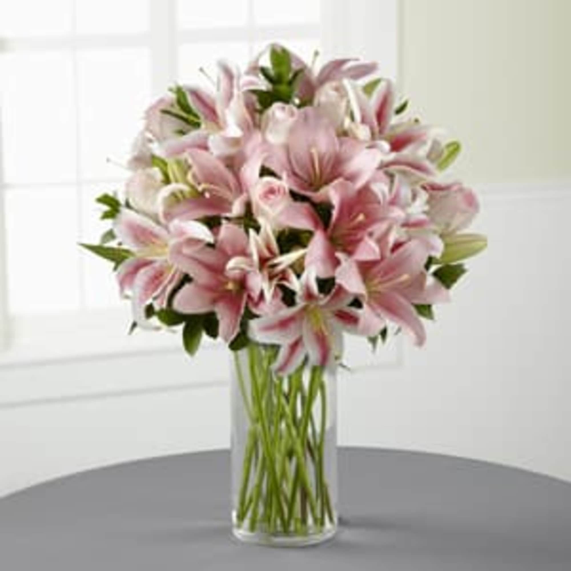 Like a lovely floral &ldquo;hug,&rdquo; this blushing bouquet delivers your sincerest condolences