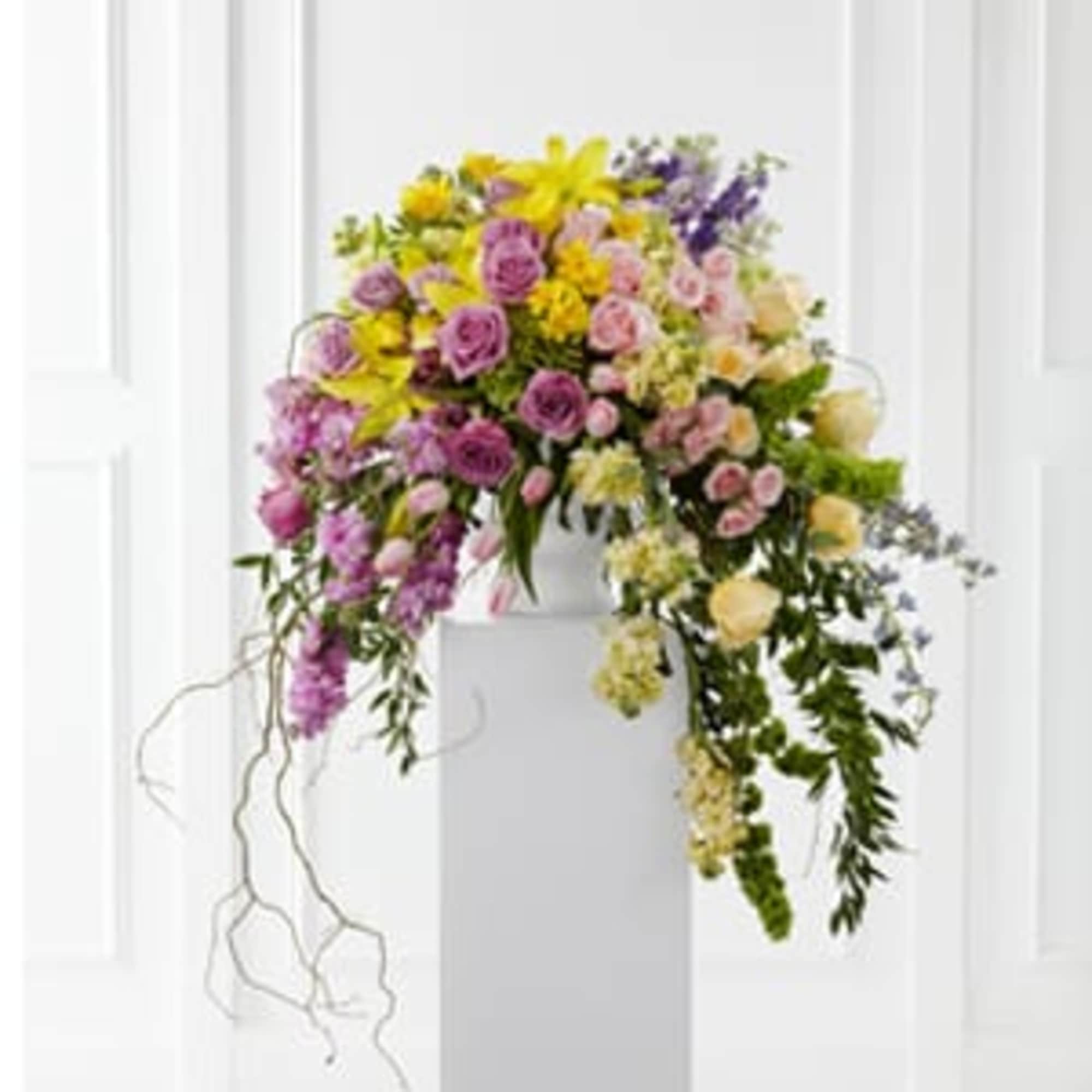 The FTD&reg; Display of Affection&trade; Arrangement is an exquisite way to commemorate