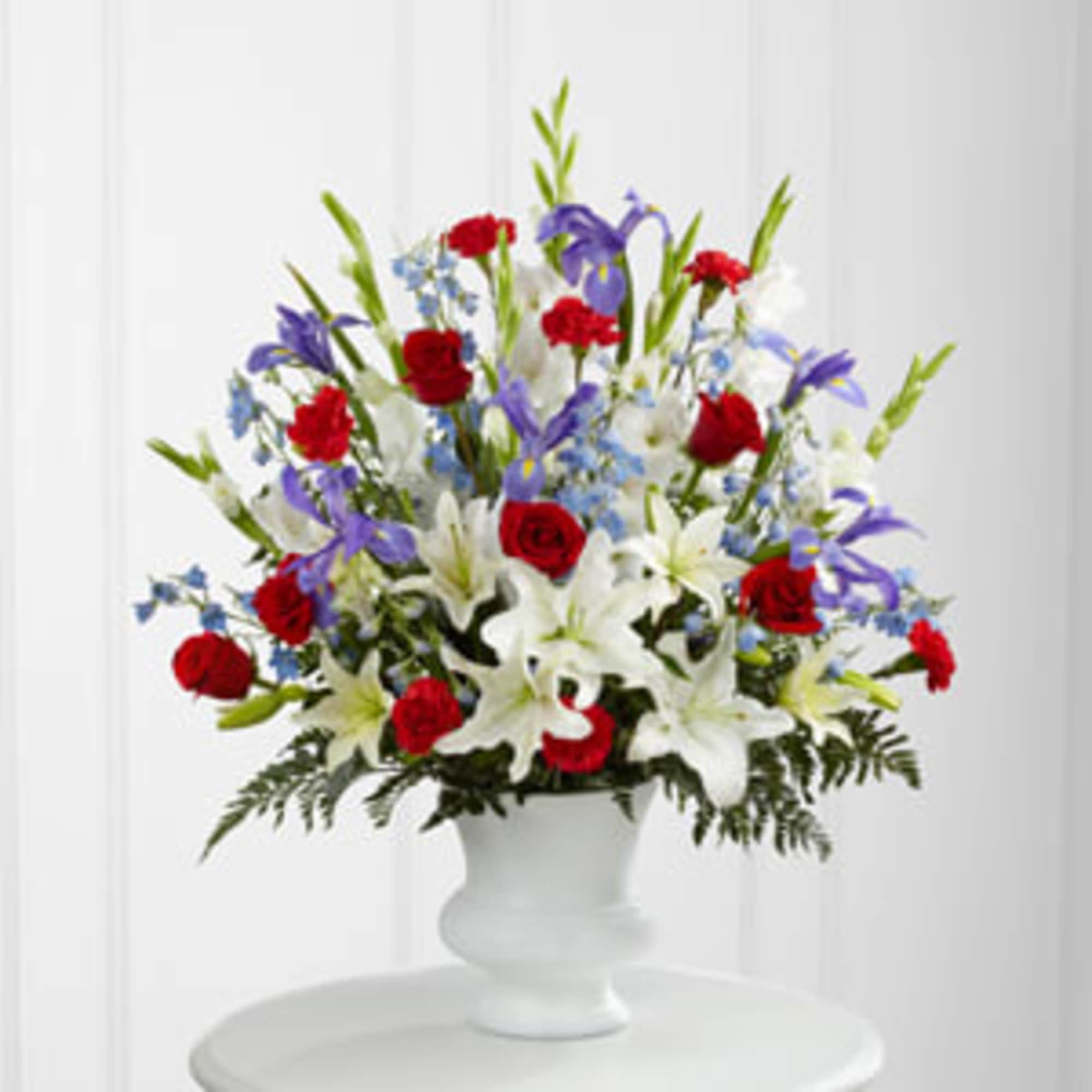 &quot;&quot;&quot;A dramatic floral salute respectfully features a heroic color palette of red