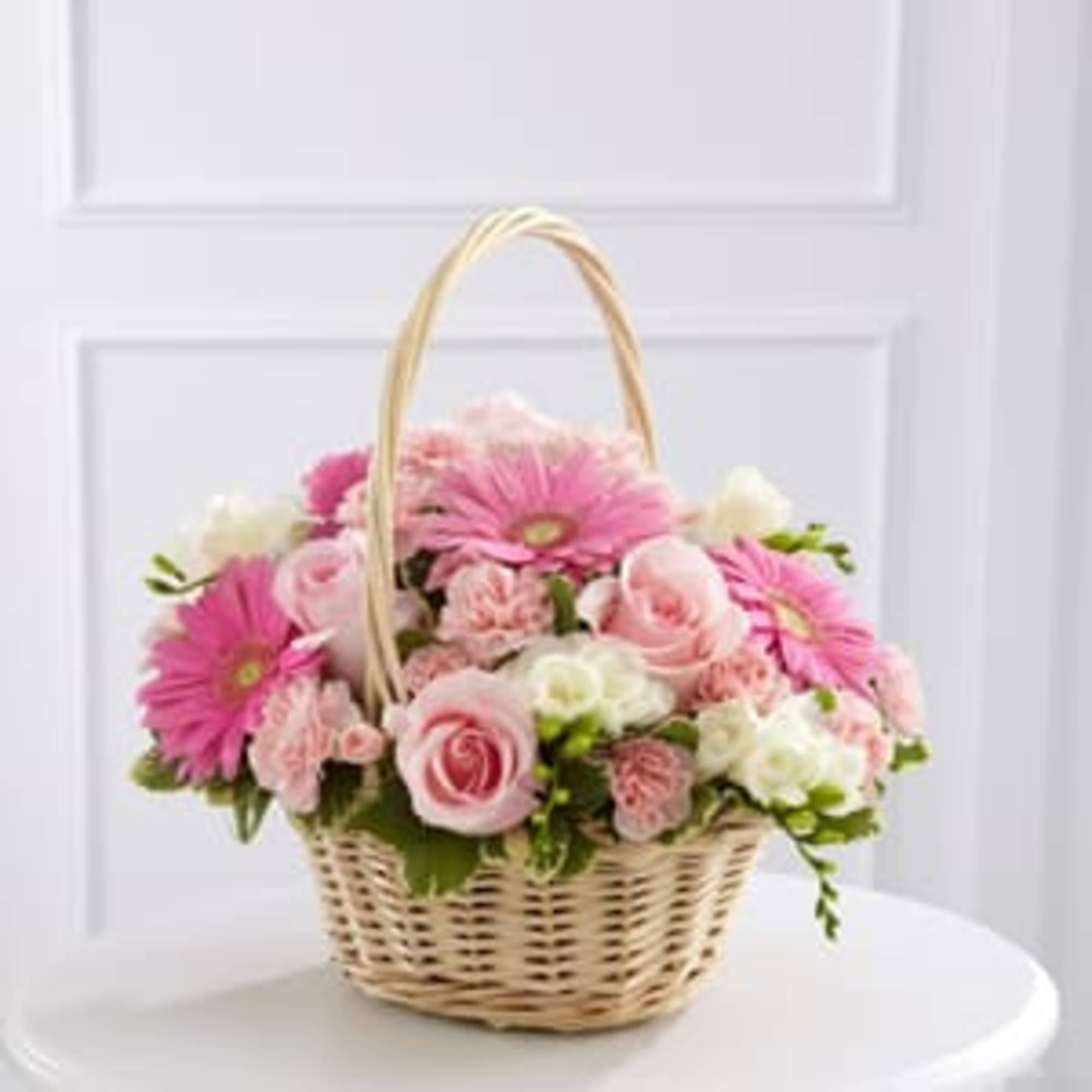 The FTD&reg; Enduring Peace&trade; Basket is bursting with grace and sweet elegance