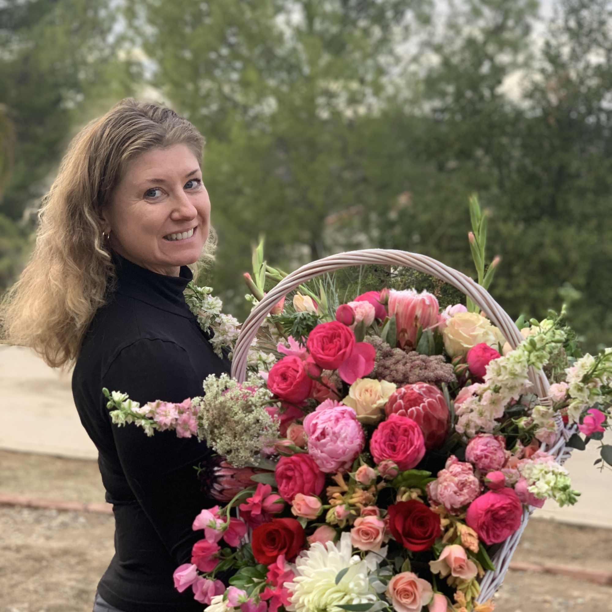 Luxury freshest blooms arranged in a large basket.