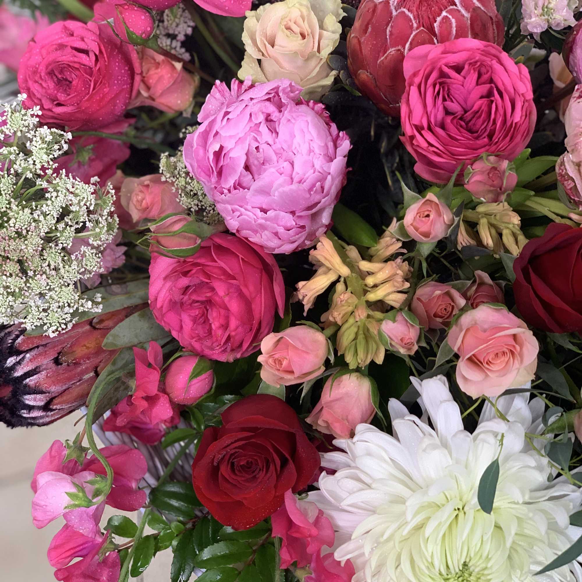 Luxury freshest blooms arranged in a large basket.