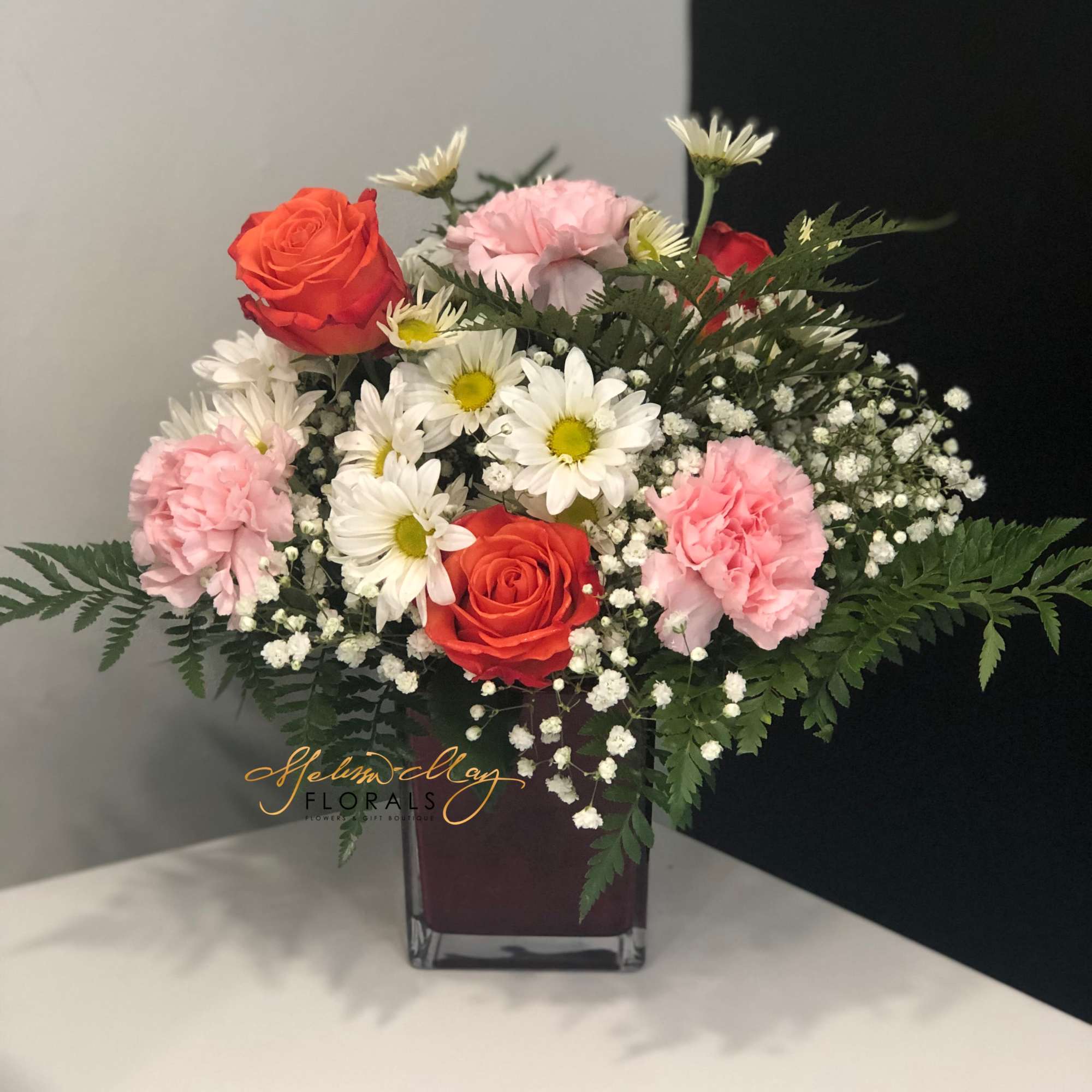 Take an enchanted walk in the forest with this gorgeous woodland-inspired arrangement.