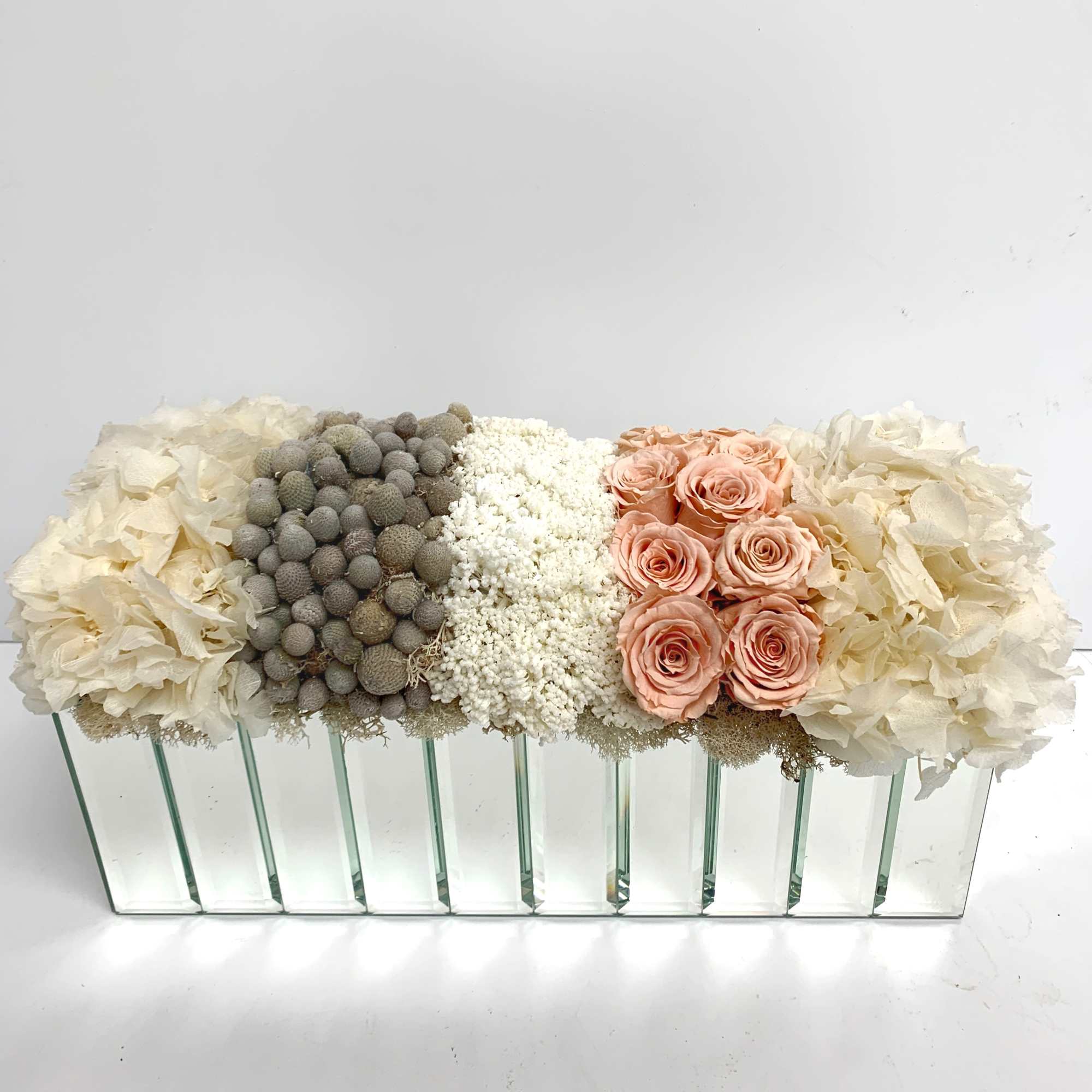 a mix of dried flowers and preserved roses pieces and a 12&quot;