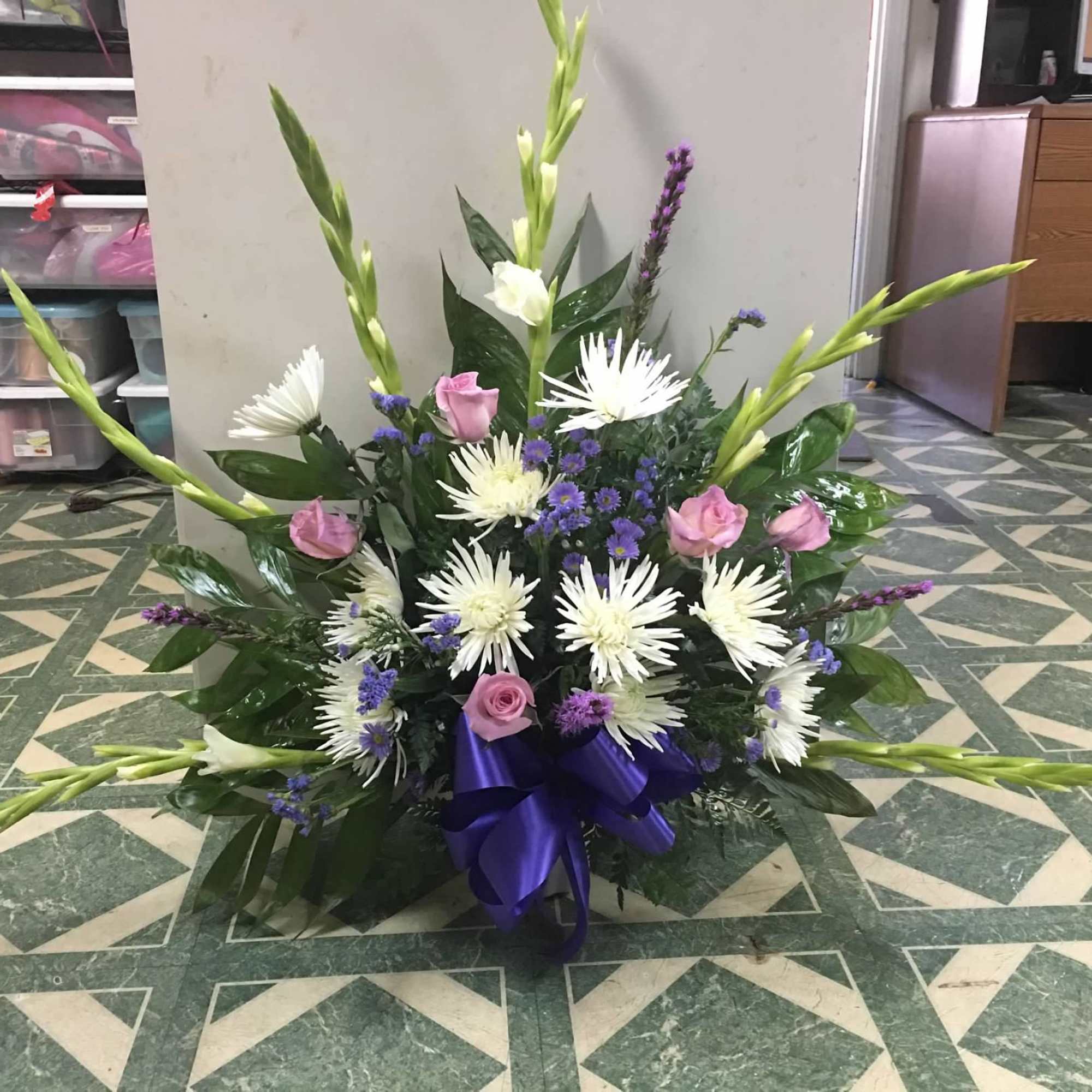 Designer's Choice - Funeral Remembrance
Beautiful colors that will represent the wonderful lady