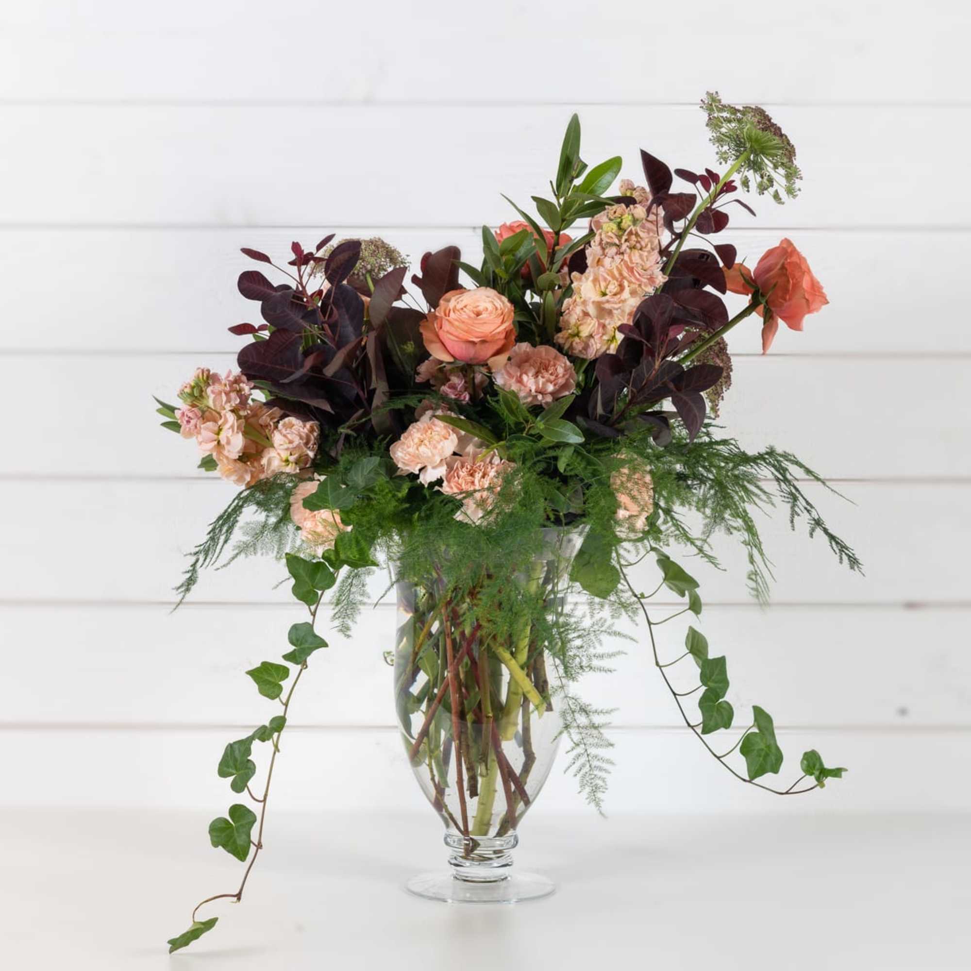 Beautiful fall oriented arrangement with rich moody tones.  