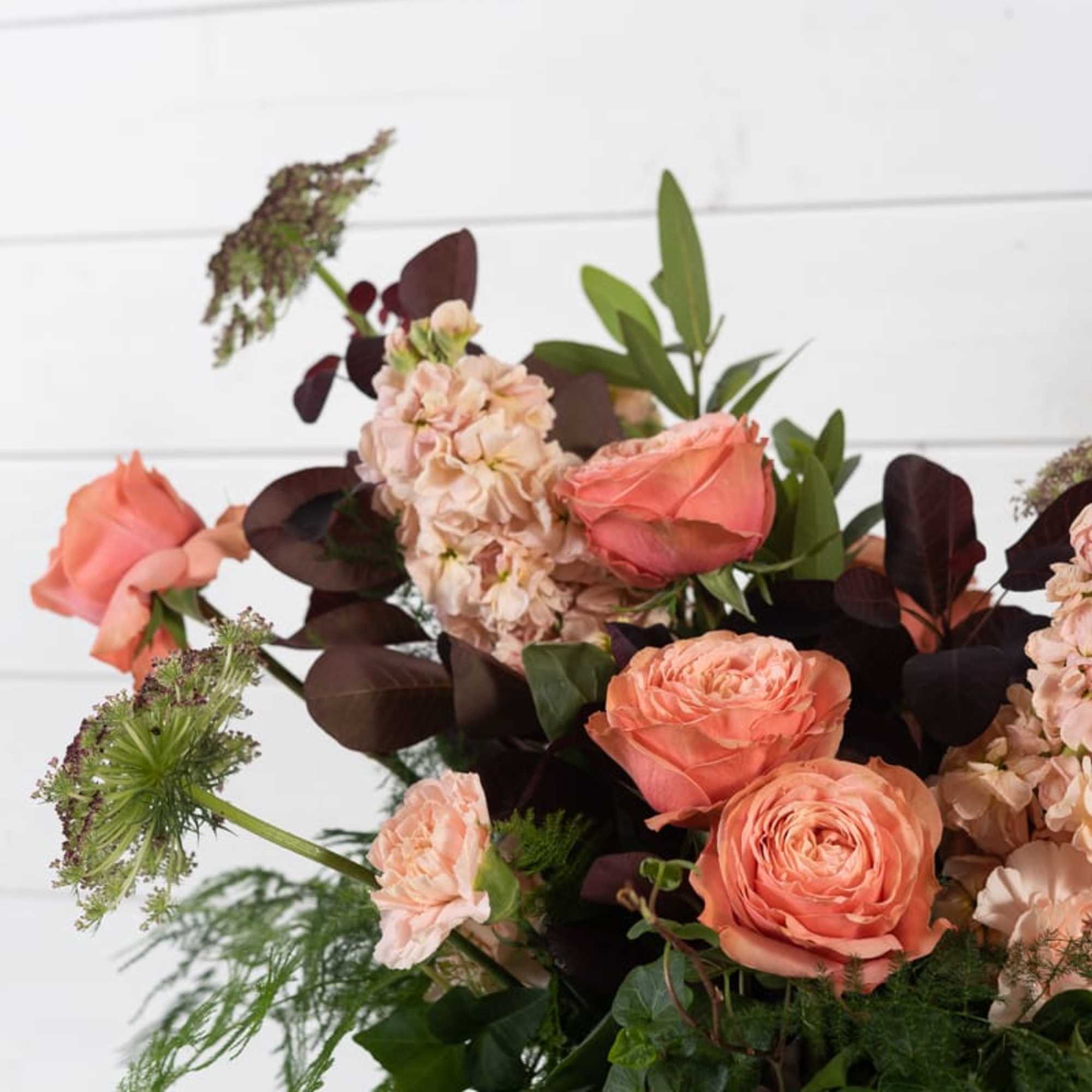 Beautiful fall oriented arrangement with rich moody tones.  