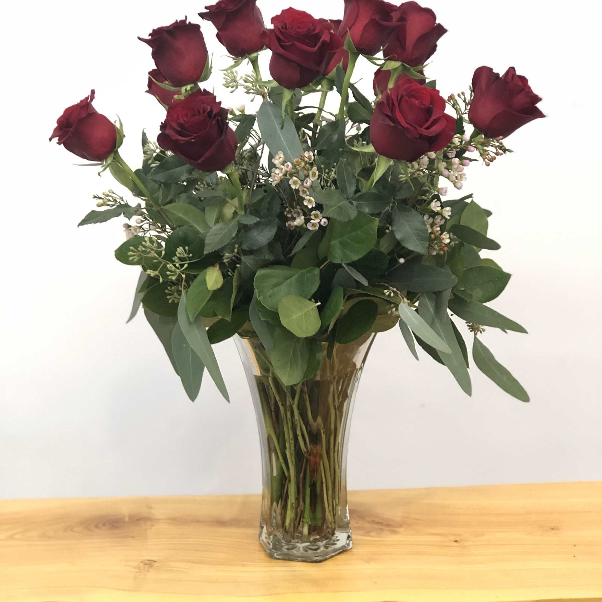 A dozen red roses are always perfect, always savored. We add even