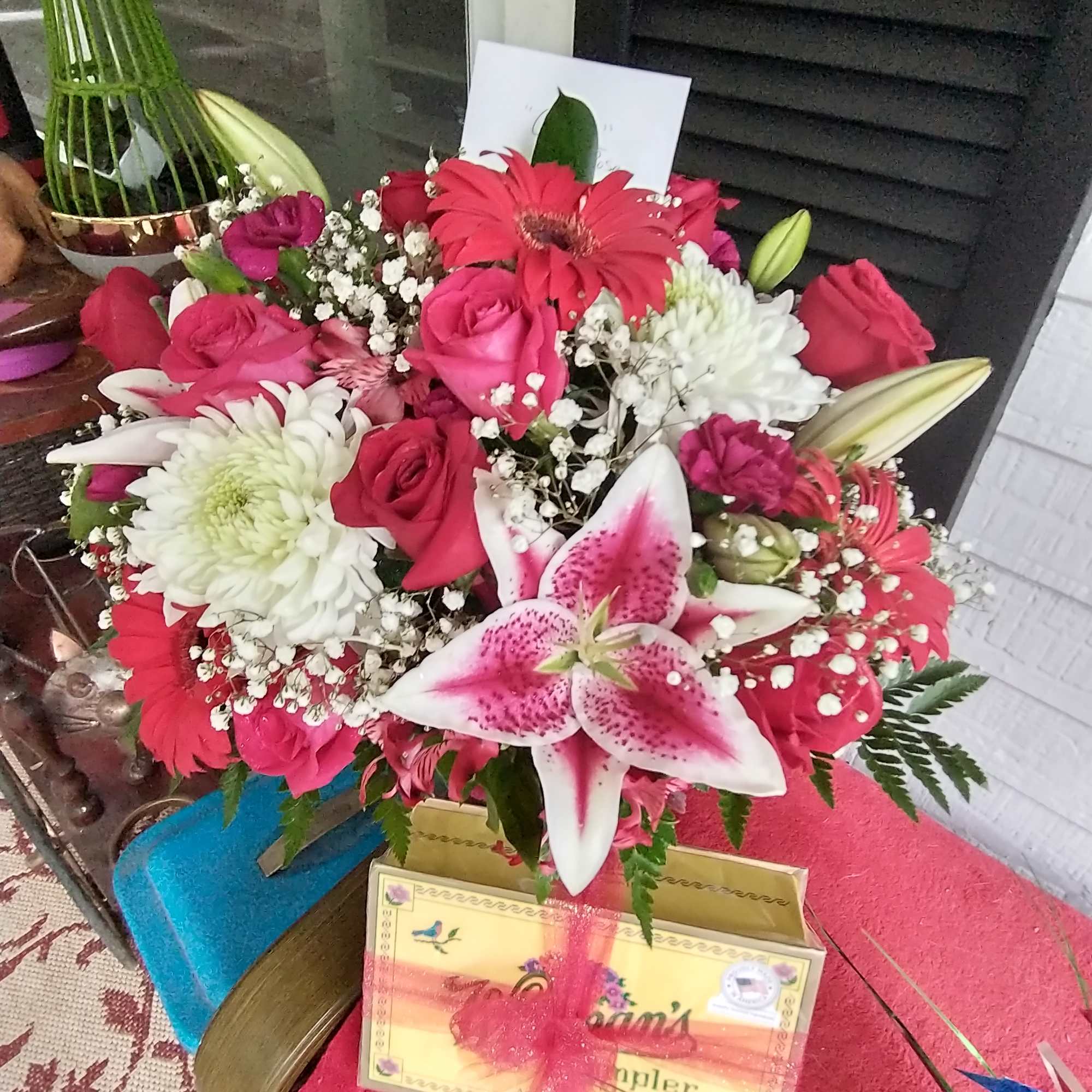 Beautiful and fragrant stargazer lilies and roses with a yummy box of