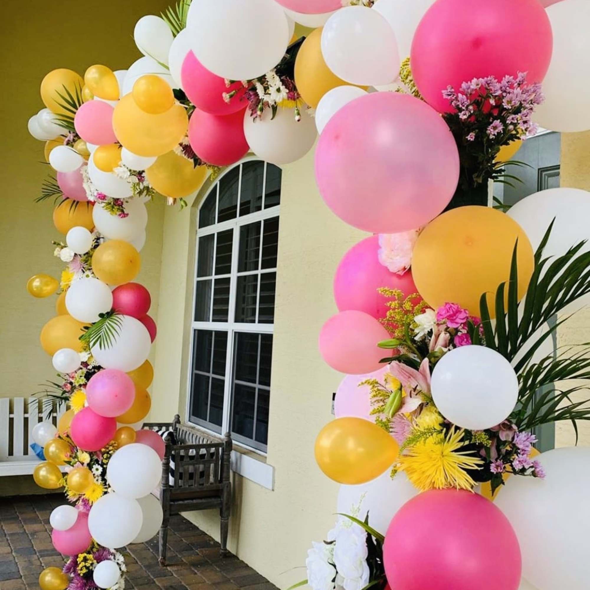 8 feet by 8 feet fresh flower/balloon arch on a heavy-duty metal
