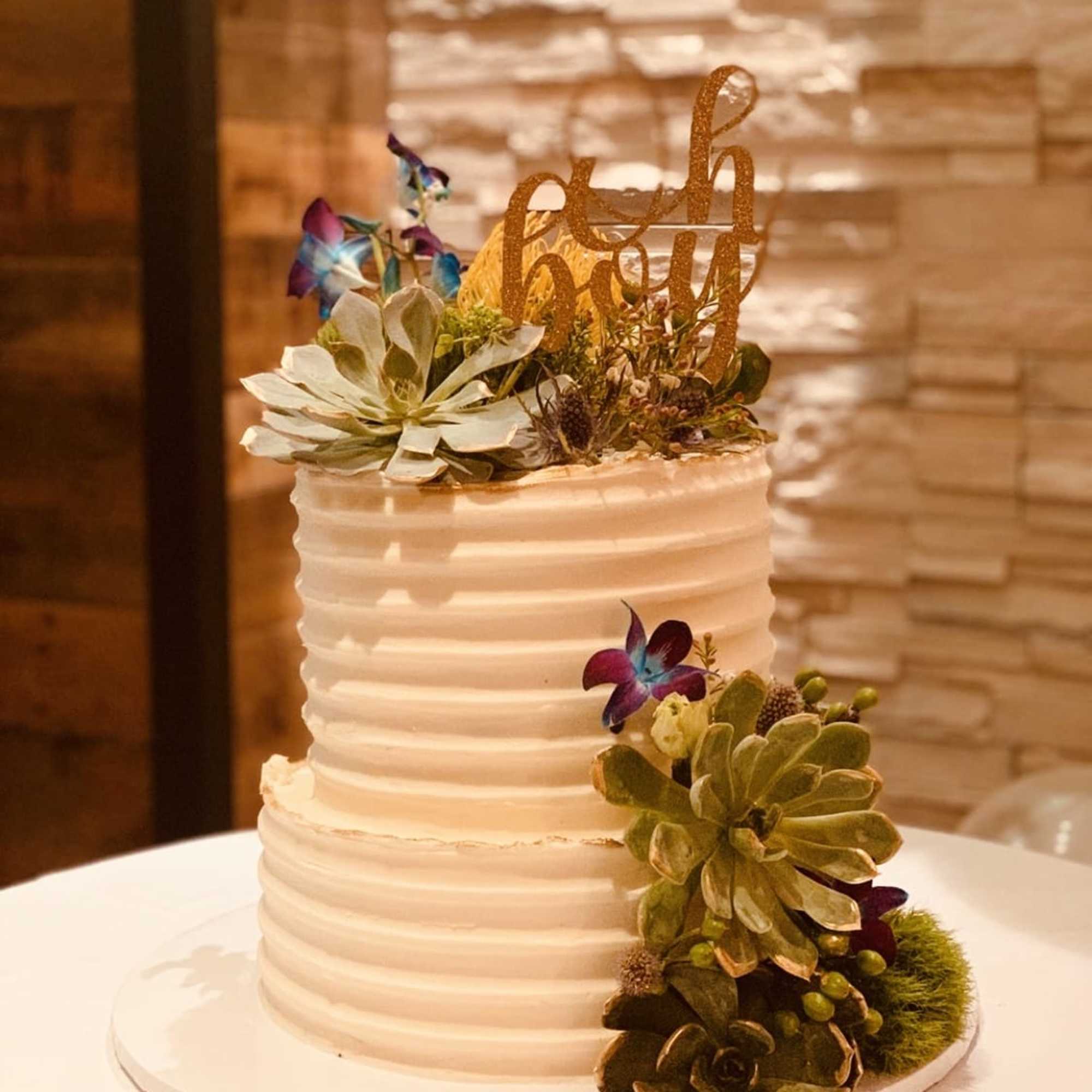 I offer decorating services of your own cake and with your flowers