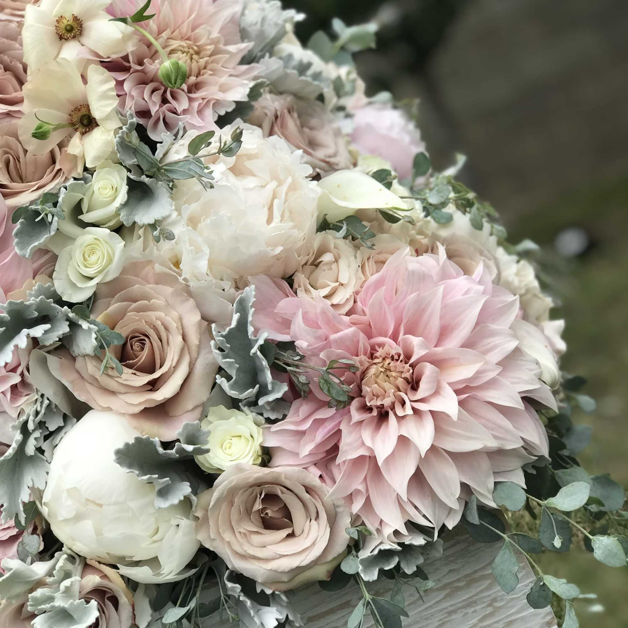 A unique arrangement inspired by a waterfall. Flowers falling down of an A unique arrangement inspired by a waterfall. Flowers falling down of an