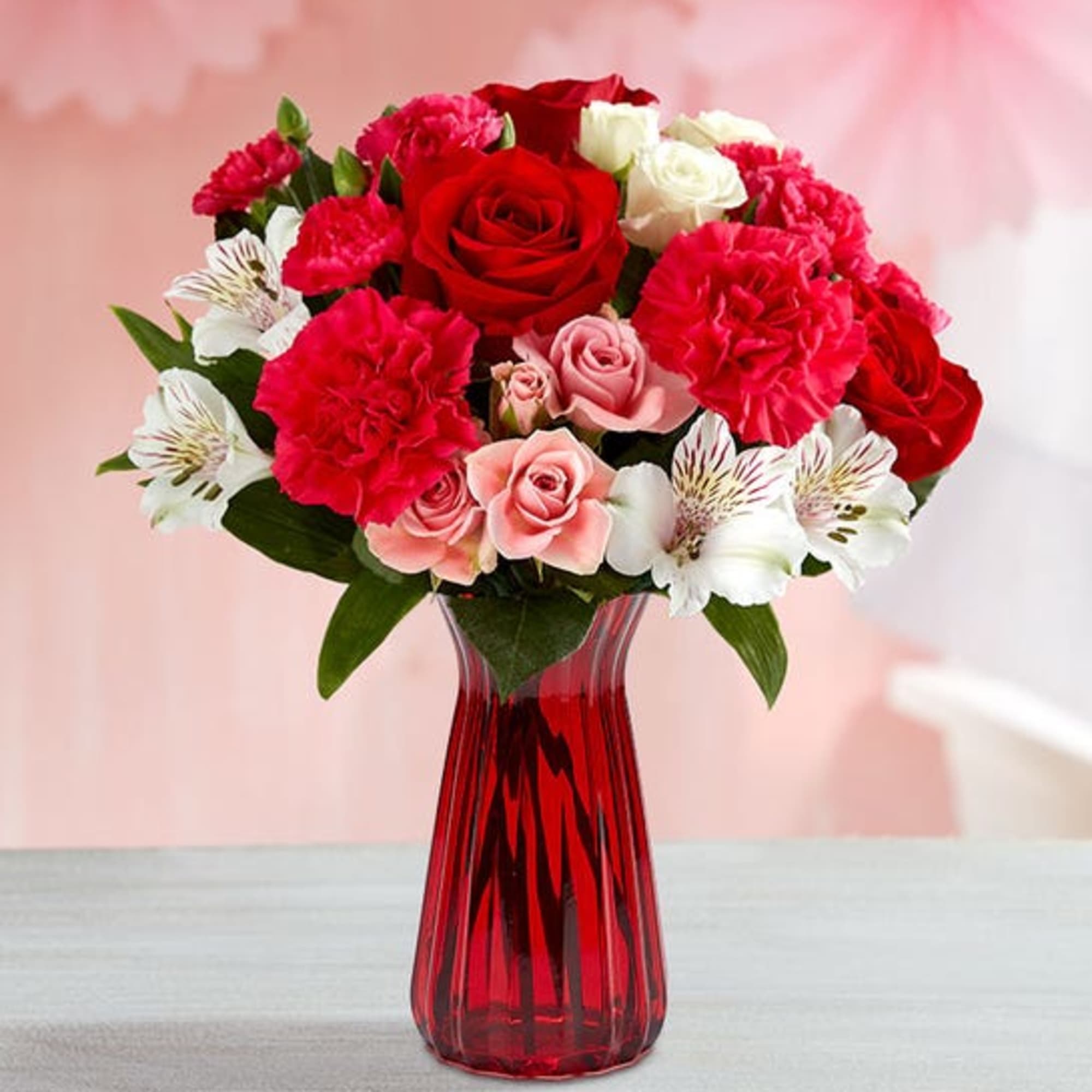 bouquet of red roses, hot pink or lavender carnations, pink mini carnations