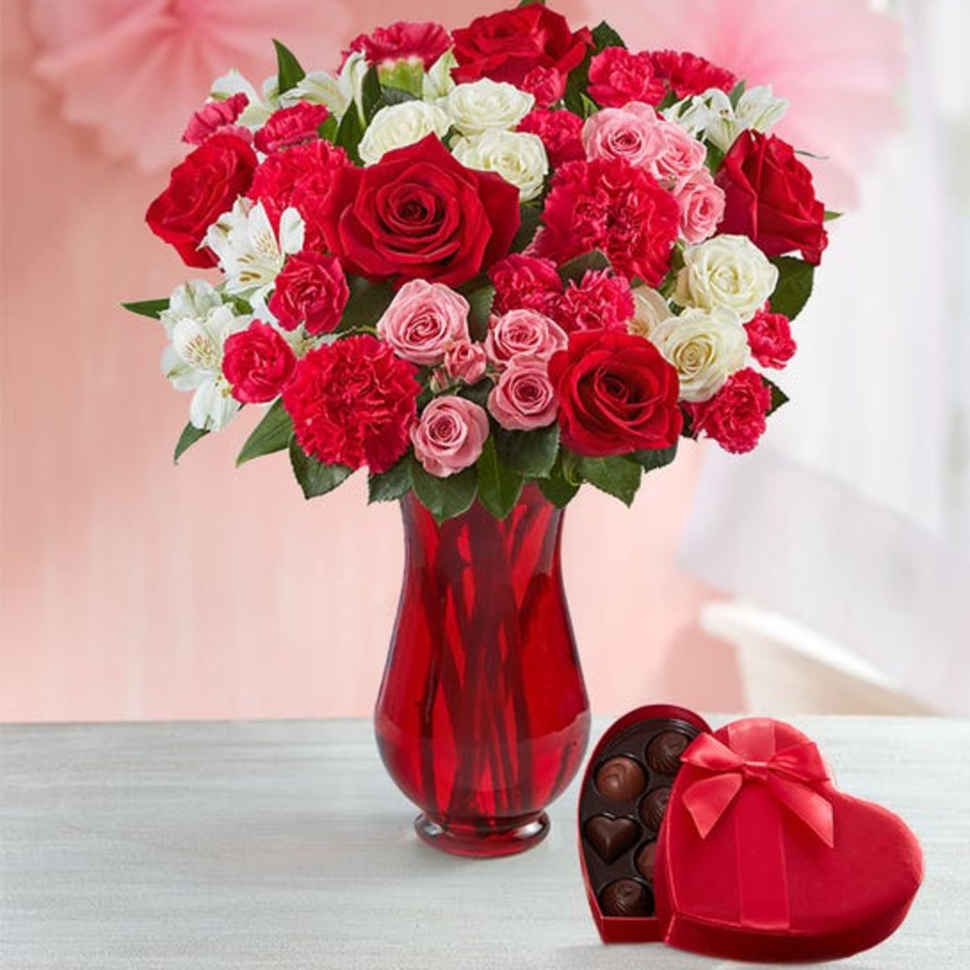 bouquet of red roses, hot pink or lavender carnations, pink mini carnations