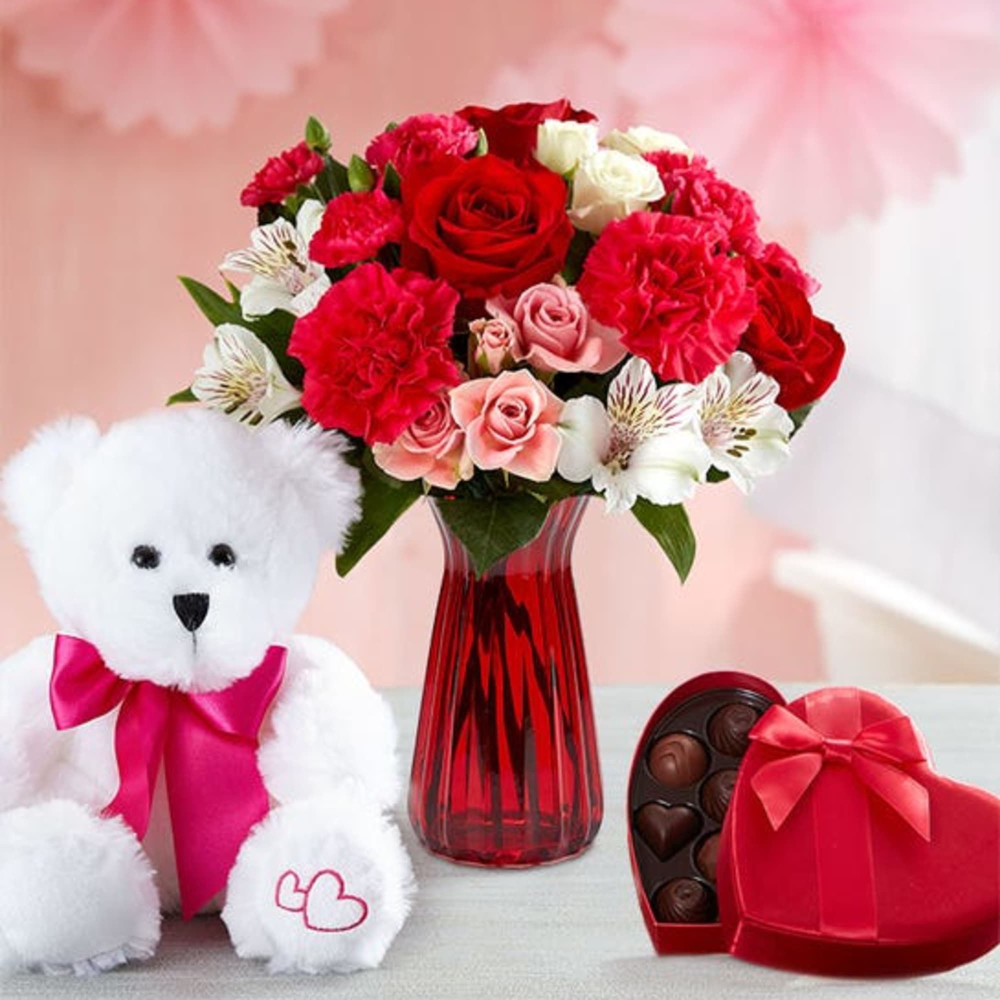 bouquet of red roses, hot pink or lavender carnations, pink mini carnations