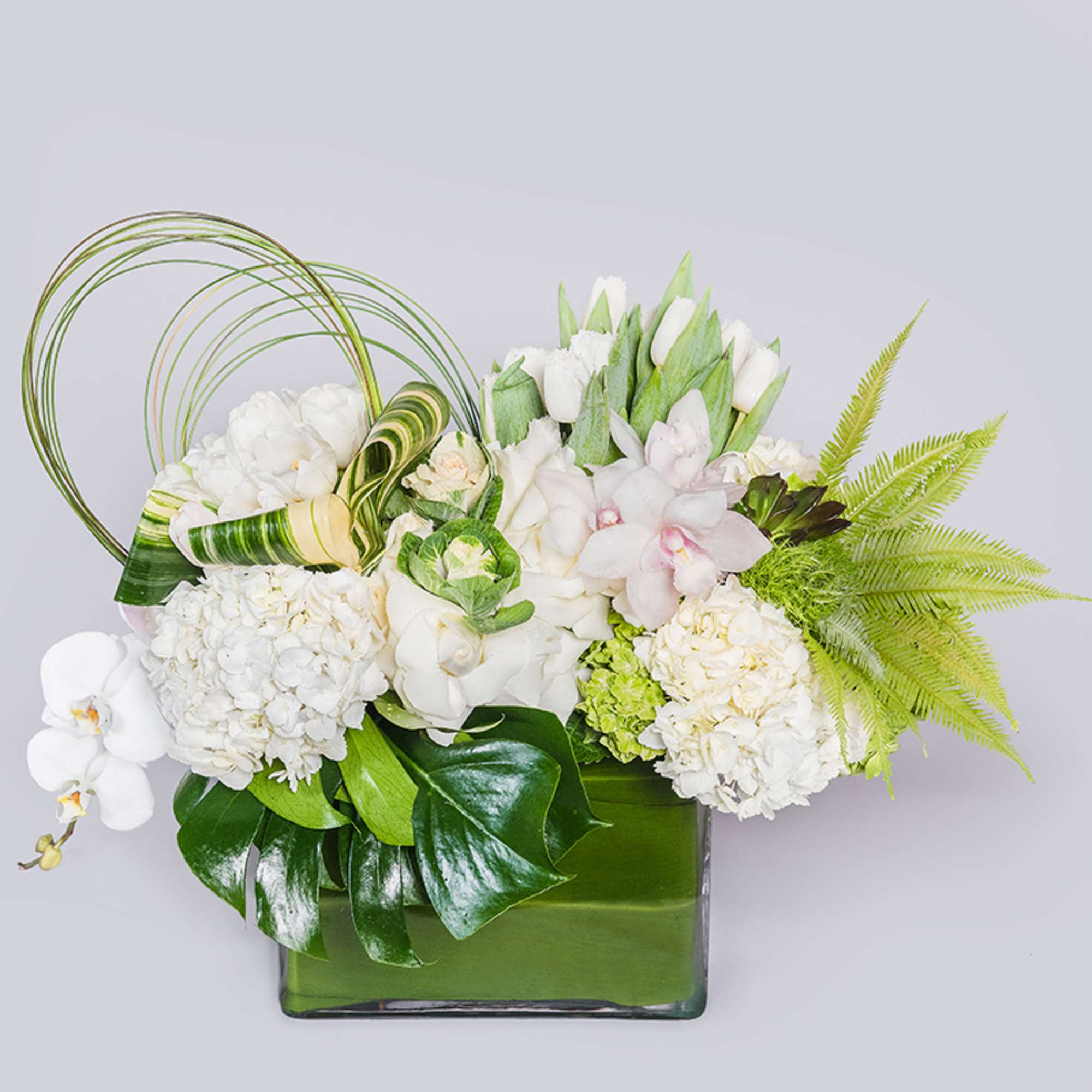 A delightful display of various textures! This beautiful arrangement is overflowing with