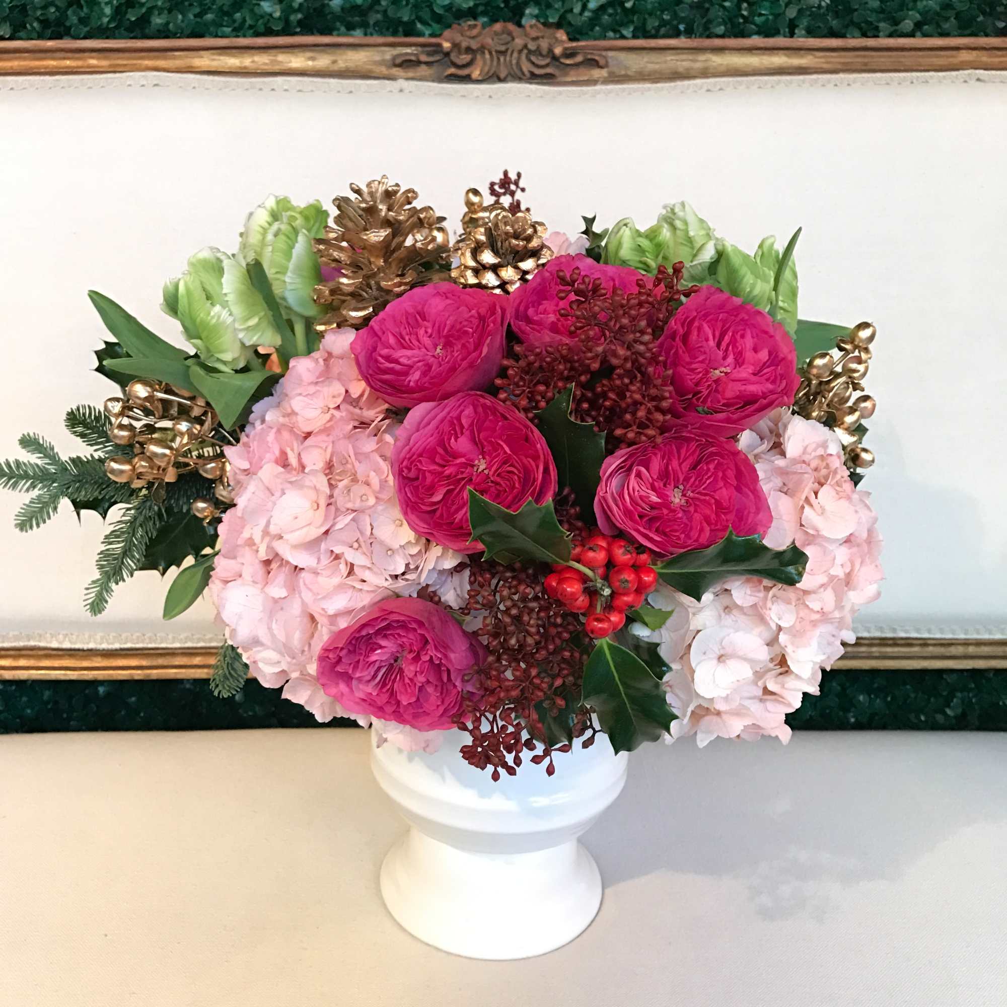 Beautiful and lush arrangement. Traditional with a modern twist. Flowers include parrot