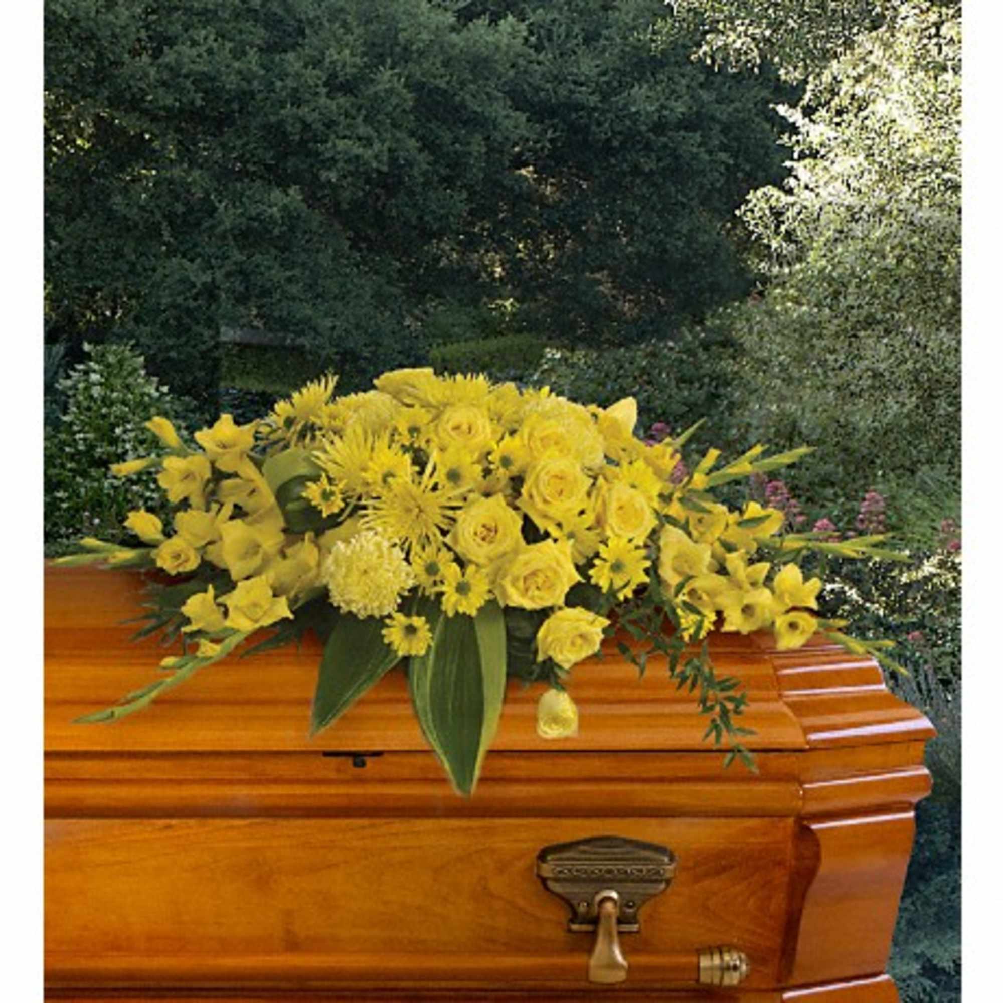 Joyous times and golden memories are recalled with this lovely half-couch casket