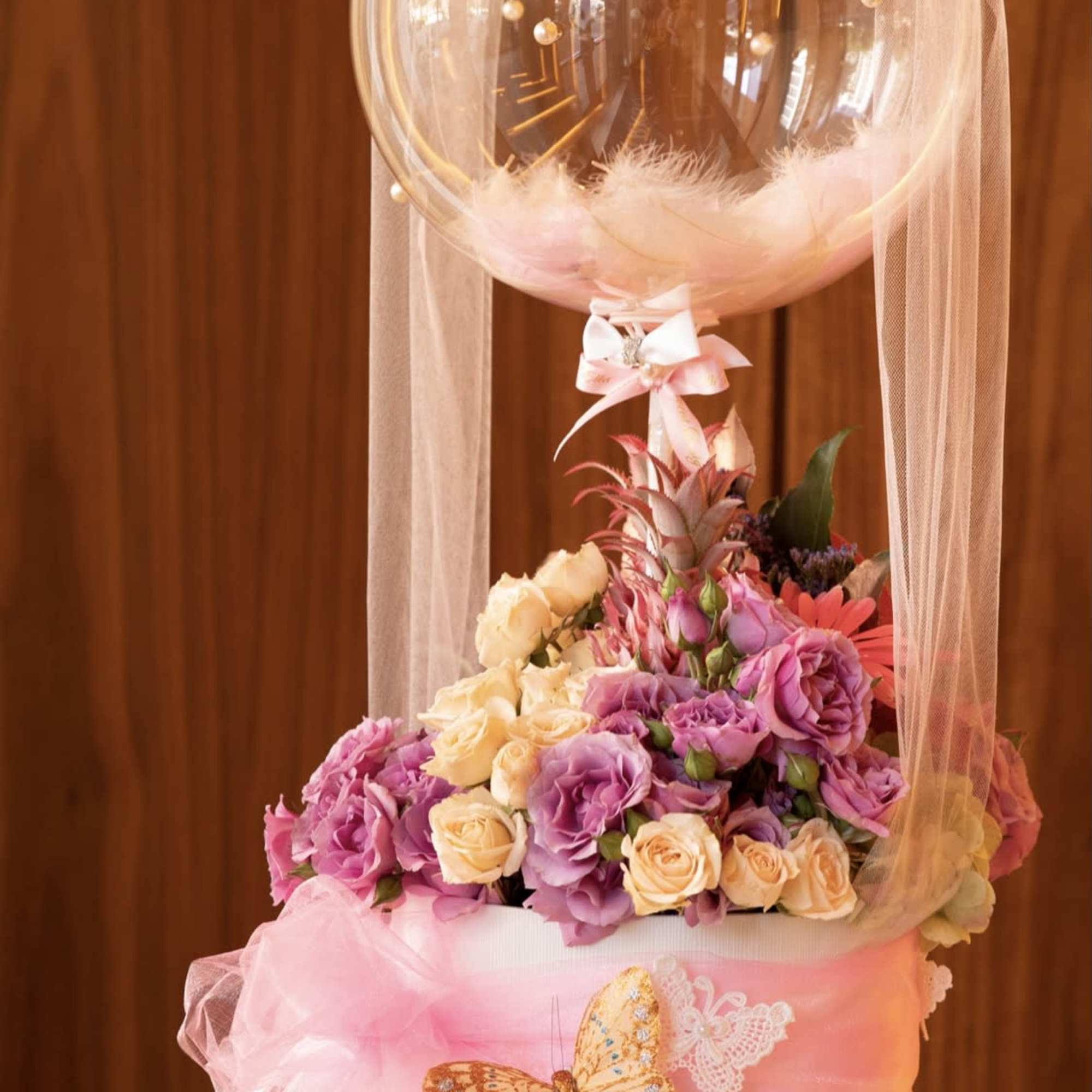 Bubble balloon-floral arrangement, will be delivered approximately looking like this 
