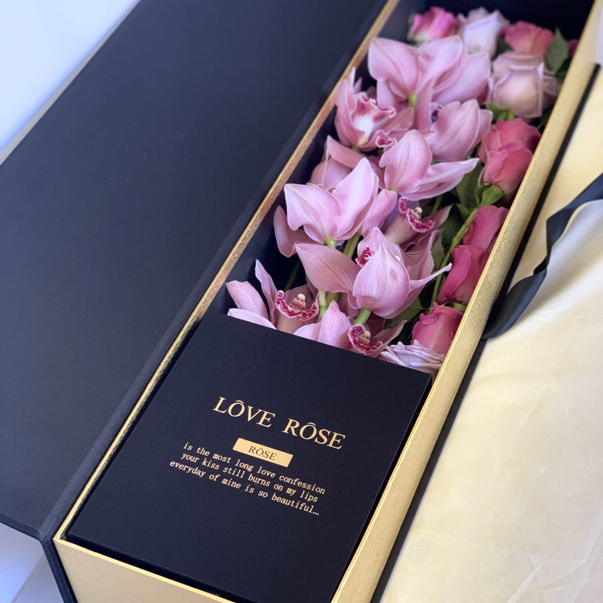 A box includes one full steam of rare Cymbidium orchid. That orchid