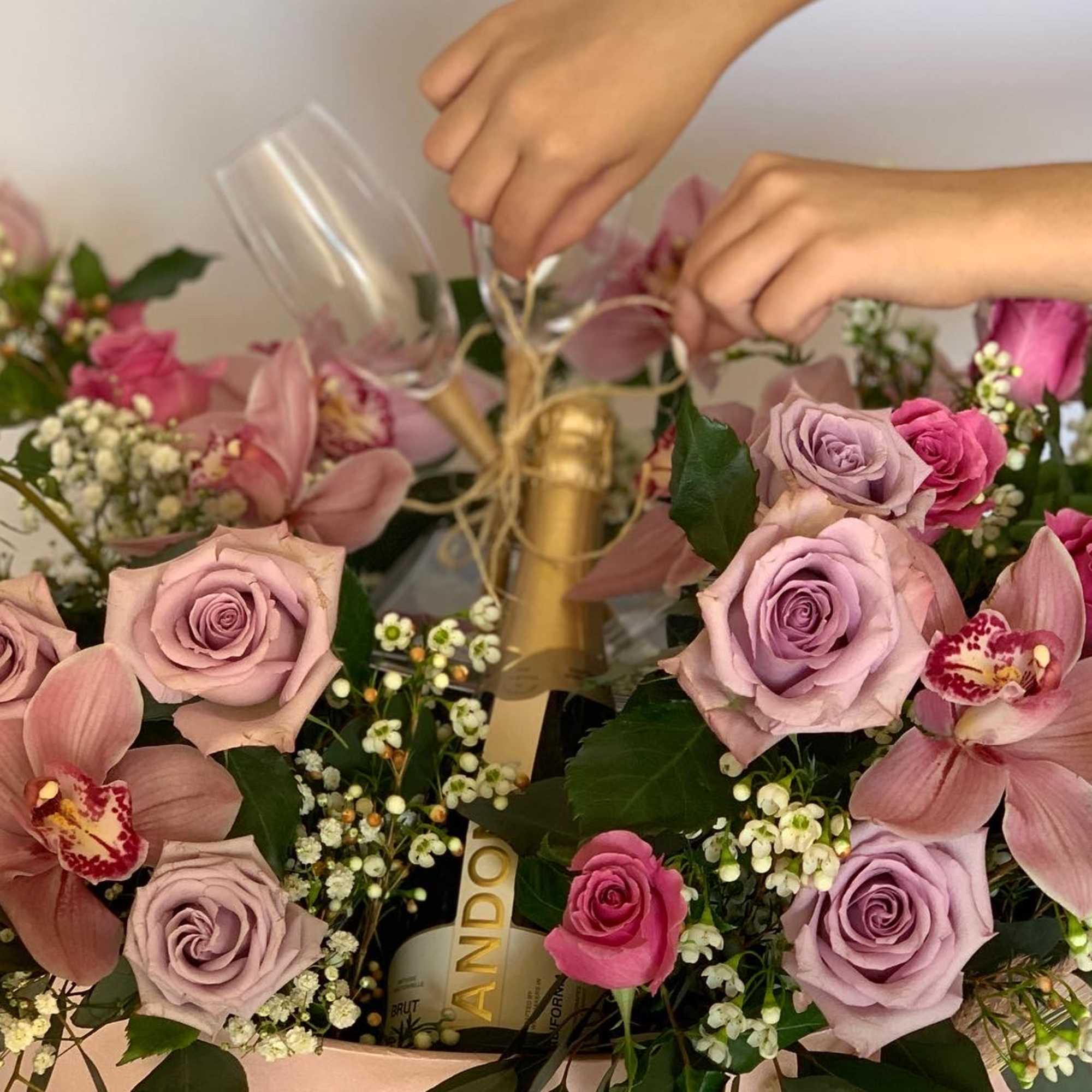 Extra large flower arrangement. Floral arrangement consist of 25 roses, eucalyptus, wax