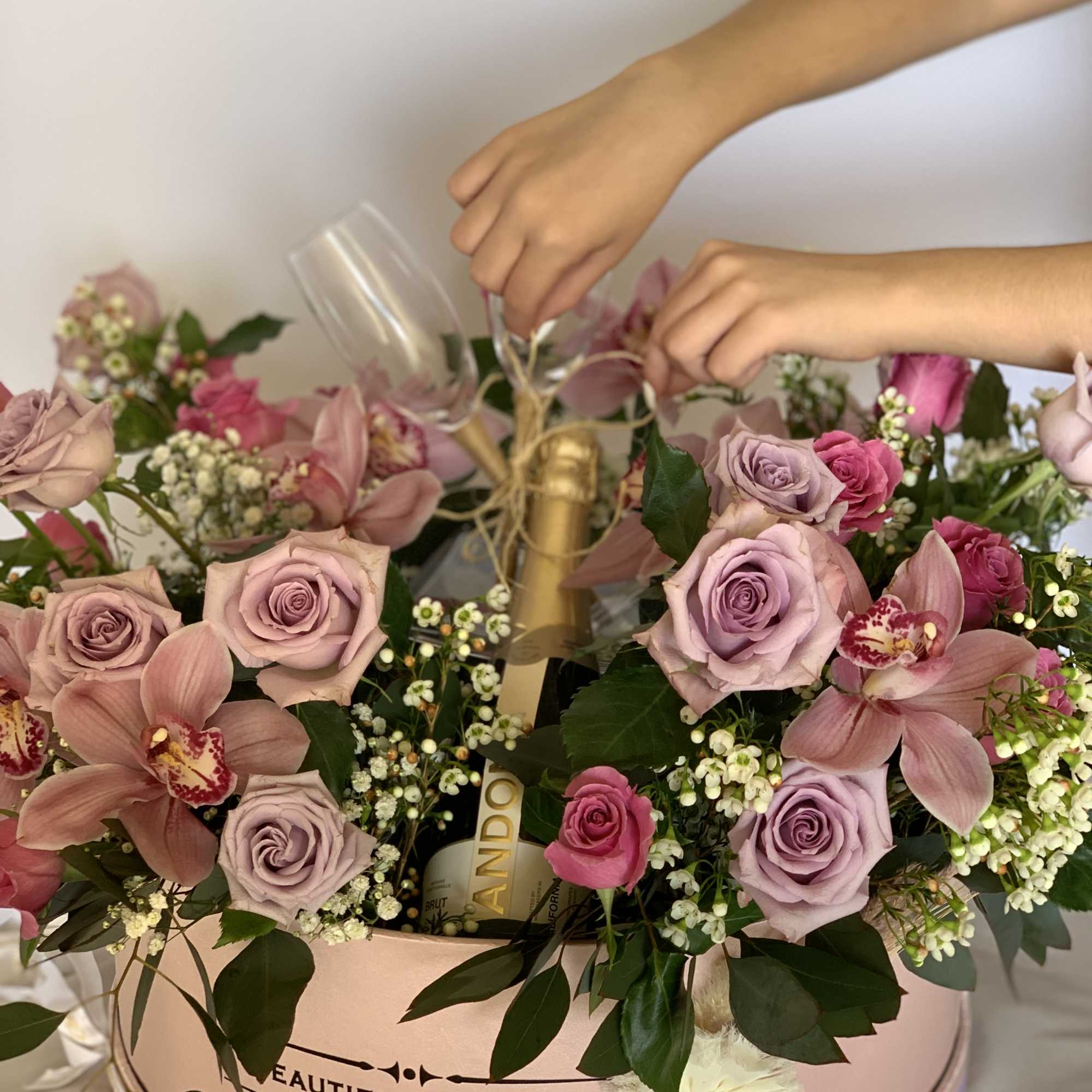 Extra large flower arrangement. Floral arrangement consist of 25 roses, eucalyptus, wax