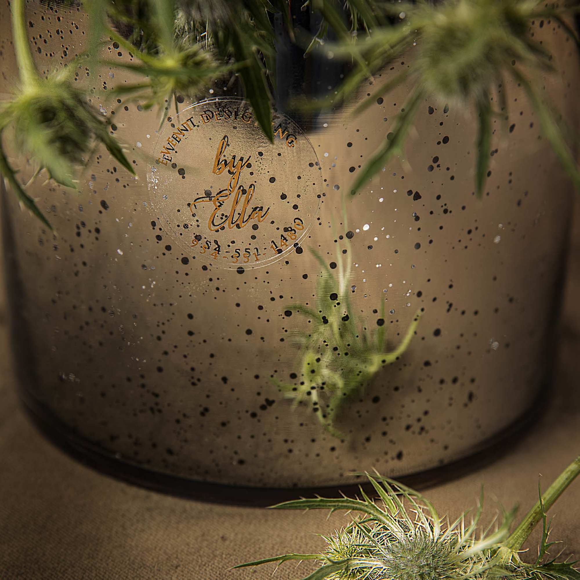 Floral ball arrangement in a glass vase designed in English style for