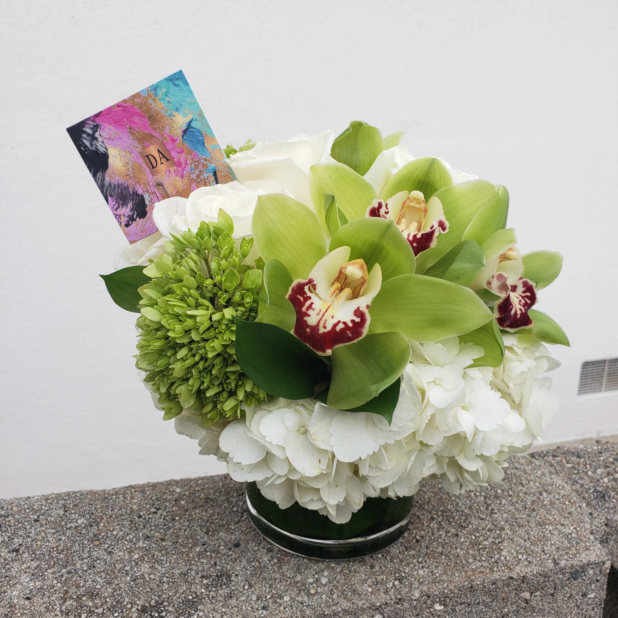This arrangement is super special, white hydrangea accompanied by a beautiful green