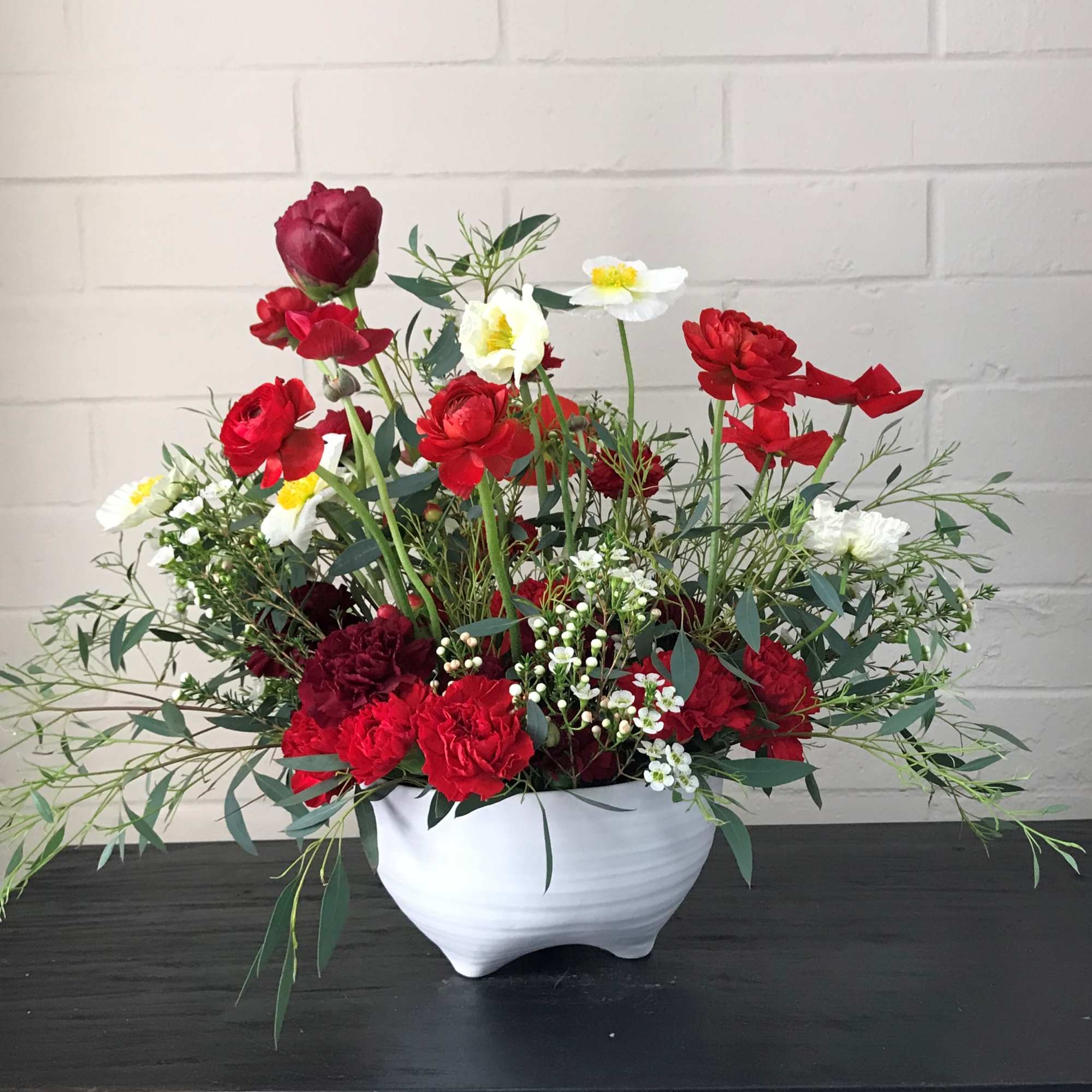 Dimensions:  26L x 18H x 20W  Striking arrangement with Peony