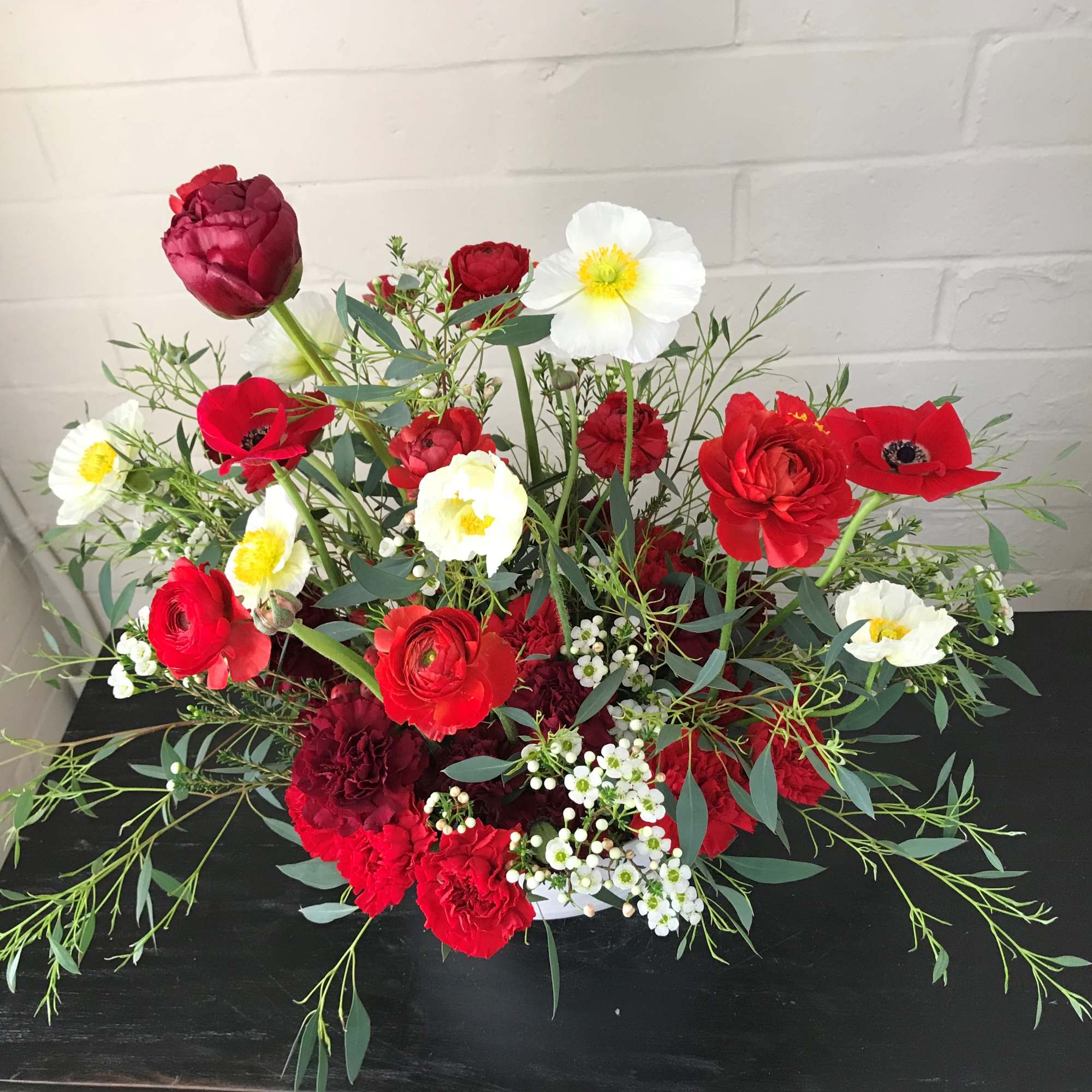 Dimensions:  26L x 18H x 20W  Striking arrangement with Peony
