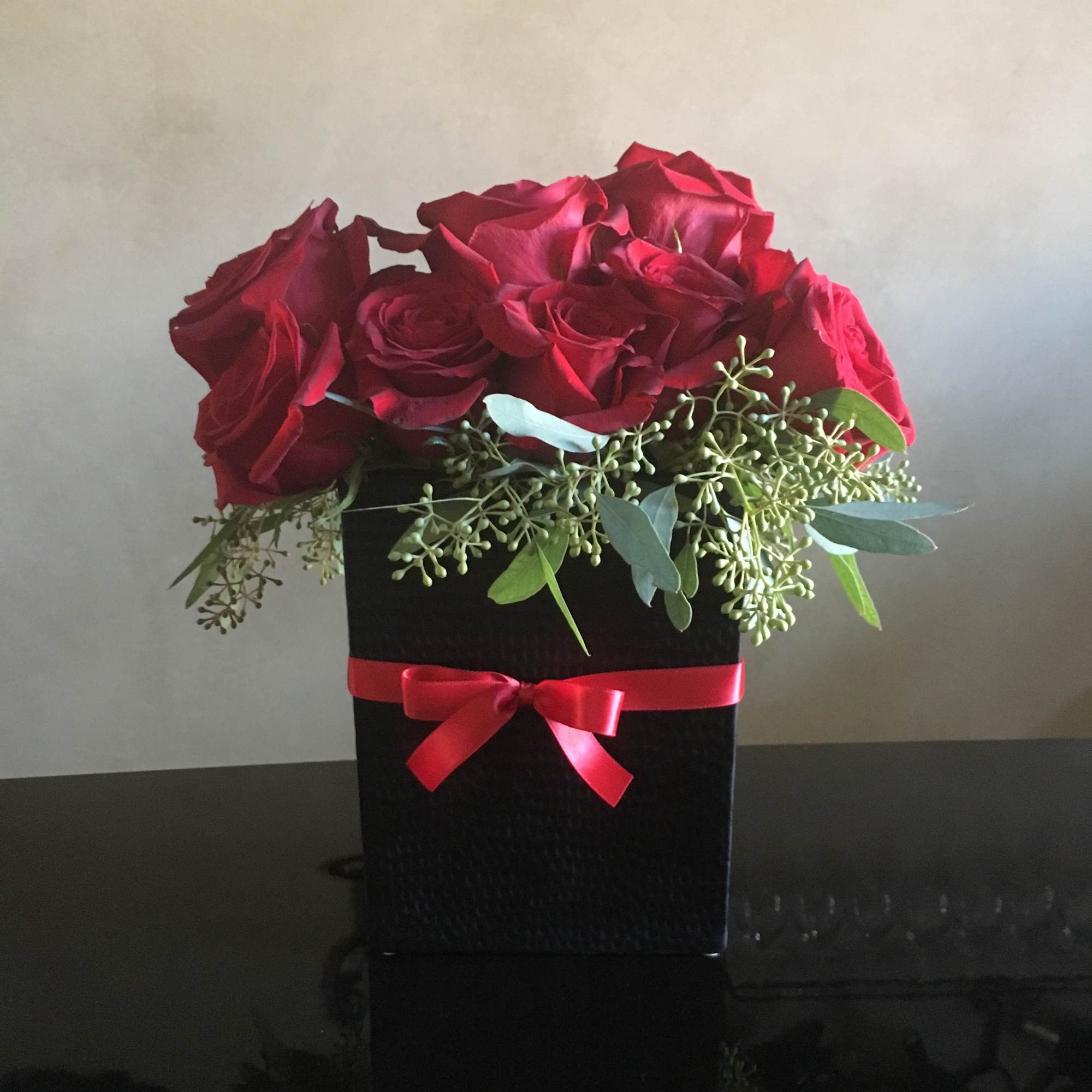 Dimensions:  12H x 6L x 3W  Classic dozen Rose arrangement